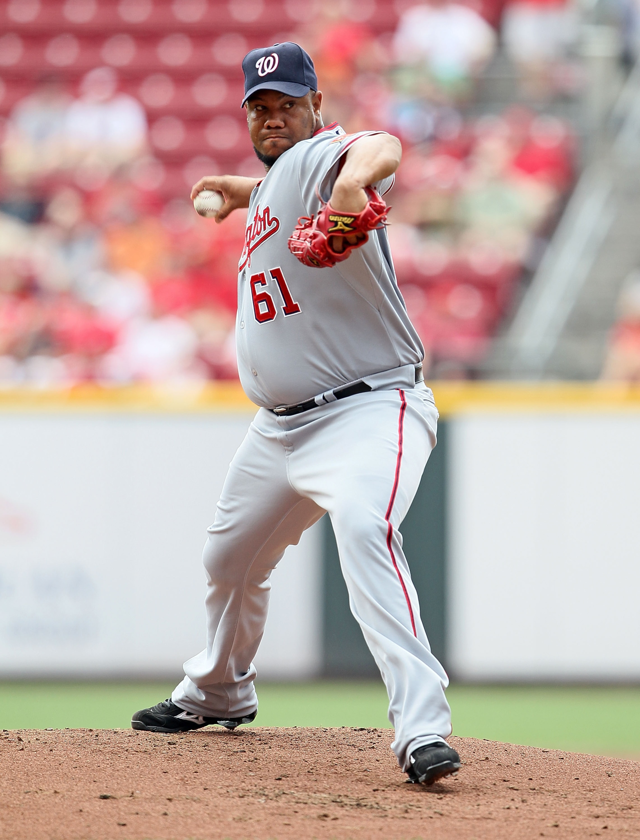 CINCINNATI - JULY 22:  Livan Hernandez #61 of the Washington Nationals throws a pitch during the game against the Cincinnati Reds at Great American Ball Park on July 22, 2010 in Cincinnati, Ohio.  (Photo by Andy Lyons/Getty Images)