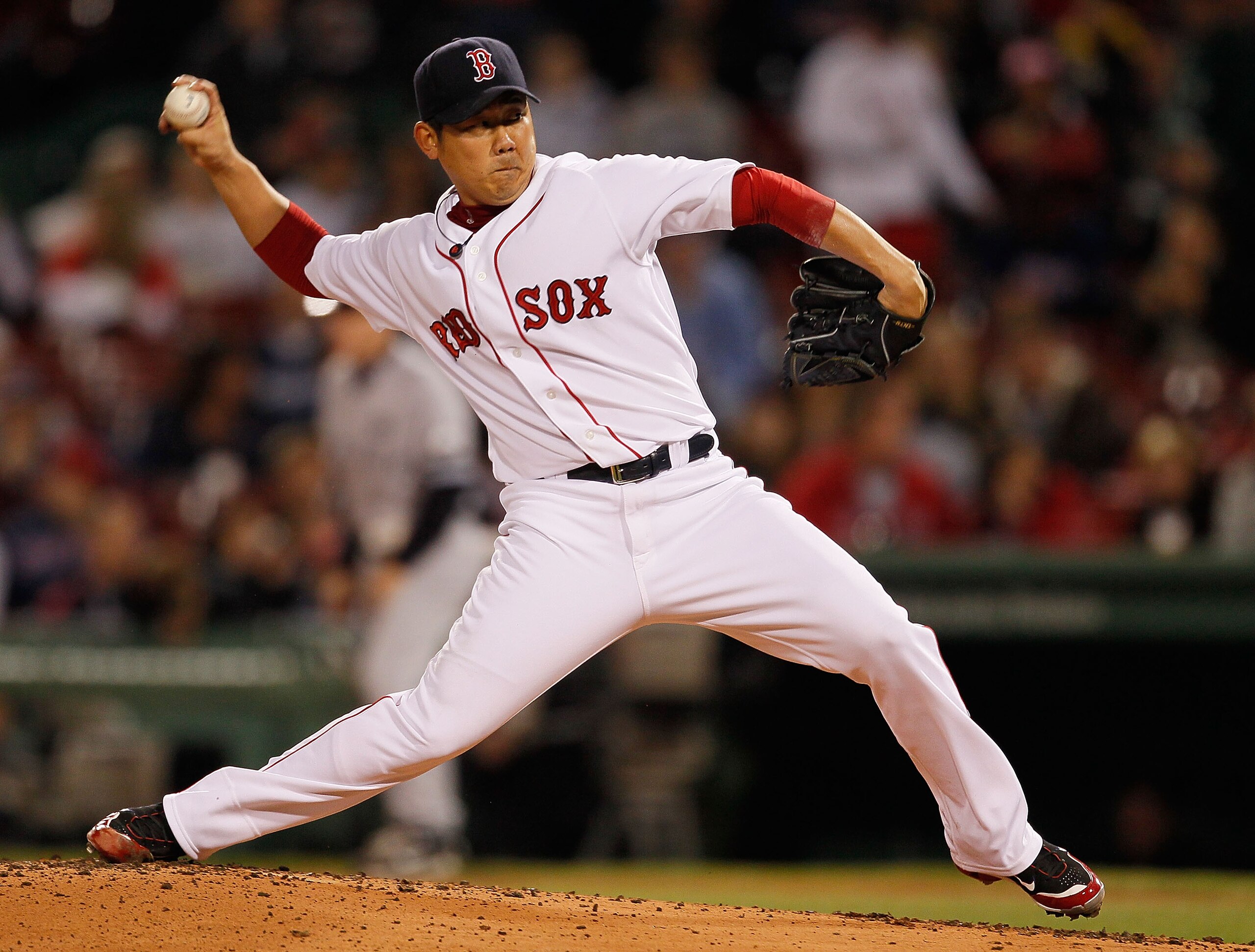 BOSTON - OCTOBER 2:  Daisuke Matsuzaka #18 of the Boston Red Sox throws against the New York Yankees in the second game of a doubleheader at Fenway Park, October 2, 2010, in Boston, Massachusetts. (Photo by Jim Rogash/Getty Images)
