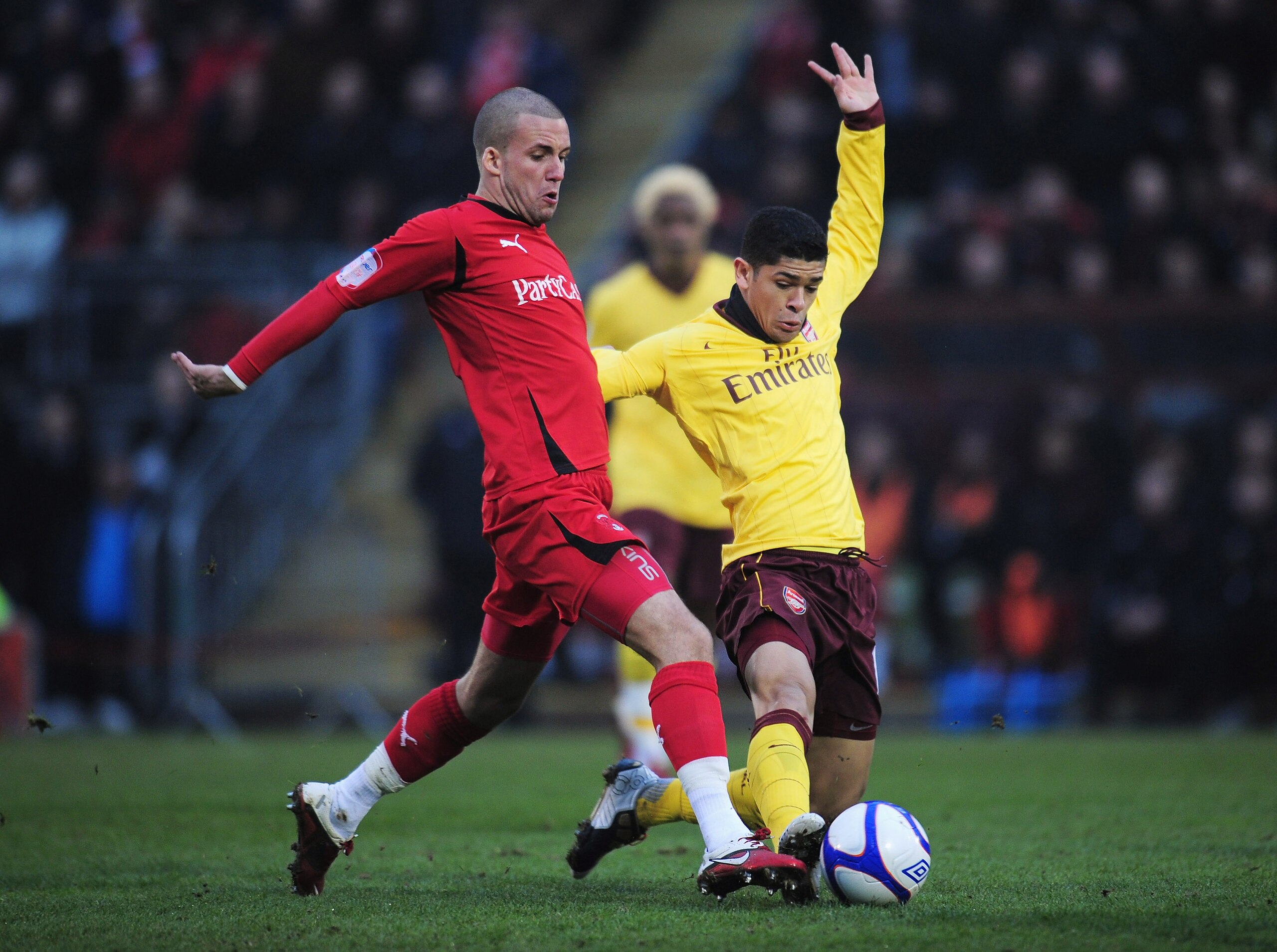 LONDON, ENGLAND - FEBRUARY 20:  Jimmy Smith of Leyton Orient (L) challenges Denilson of Arsenal during the FA Cup sponsored by E.ON 5th Round match between Leyton Orient and Arsenal at the Matchroom Stadium on February 20, 2011 in London, England.  (Photo