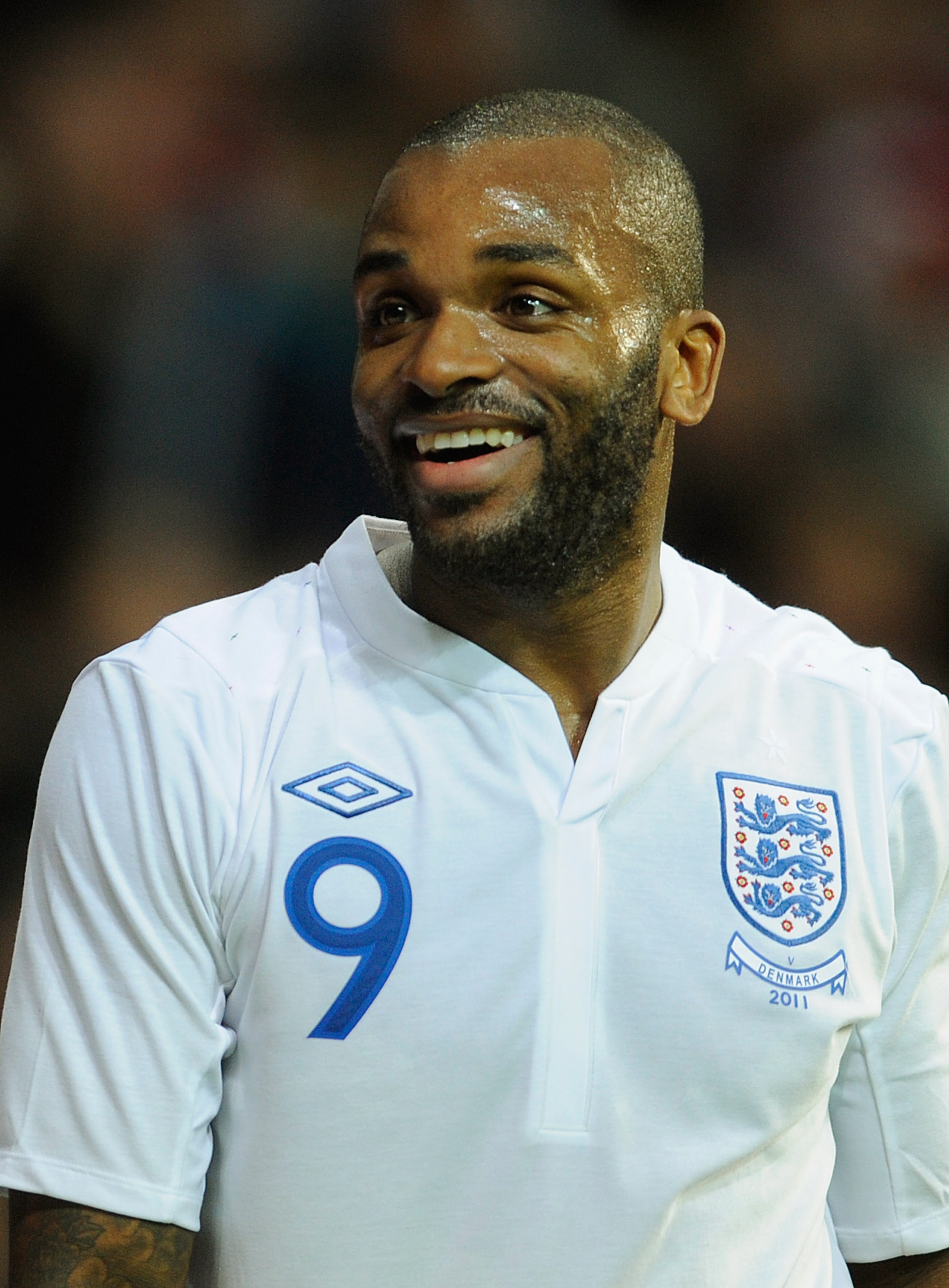 COPENHAGEN, DENMARK - FEBRUARY 09:  Darren Bent of England smiles during the international friendly match between Denmark and England at Parken Stadium on February 9, 2011 in Copenhagen, .  (Photo by Michael Regan/Getty Images)