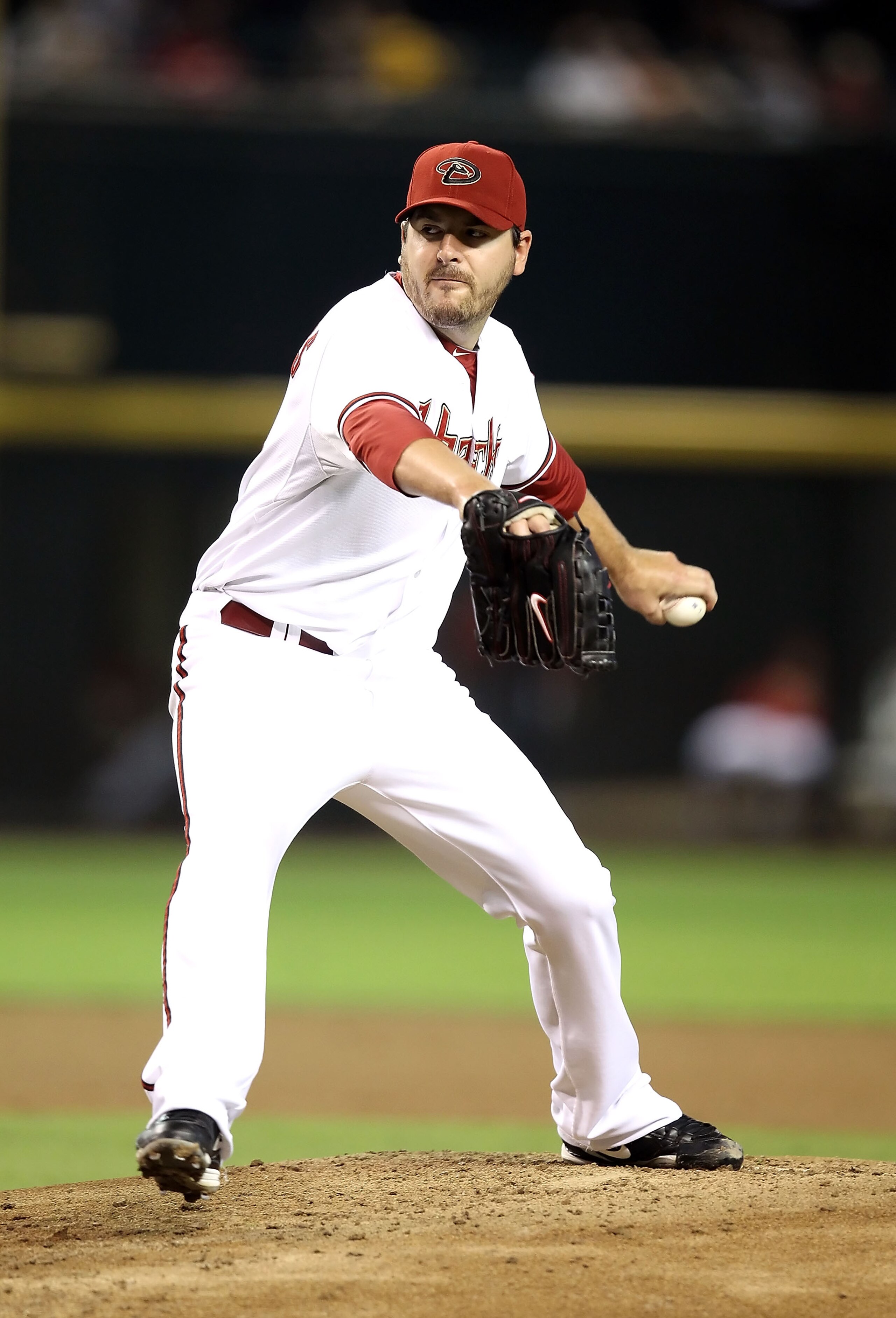 PHOENIX - SEPTEMBER 21:  Starting pitcher Joe Saunders #34 of the Arizona Diamondbacks pitches against the Colorado Rockies during the Major League Baseball game at Chase Field on September 21, 2010 in Phoenix, Arizona.  (Photo by Christian Petersen/Getty