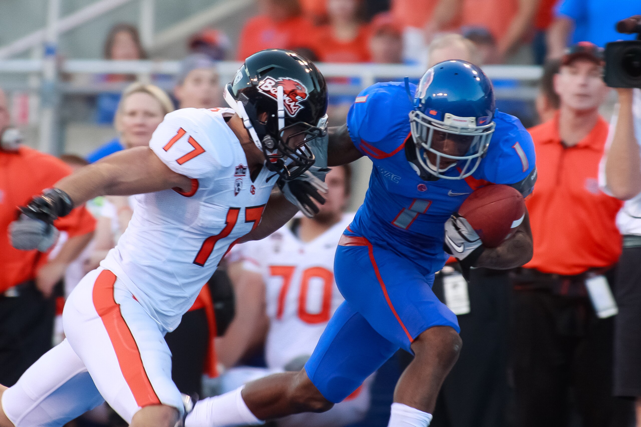 BOISE, ID - SEPTEMBER 25:  Wide receiver Titus Young #1 of the Boise State Broncos runs the ball against cornerback Brandon Hardin #17 of the Oregon State Beavers at Bronco Stadium on September 25, 2010 in Boise, Idaho.  (Photo by Otto Kitsinger III/Getty