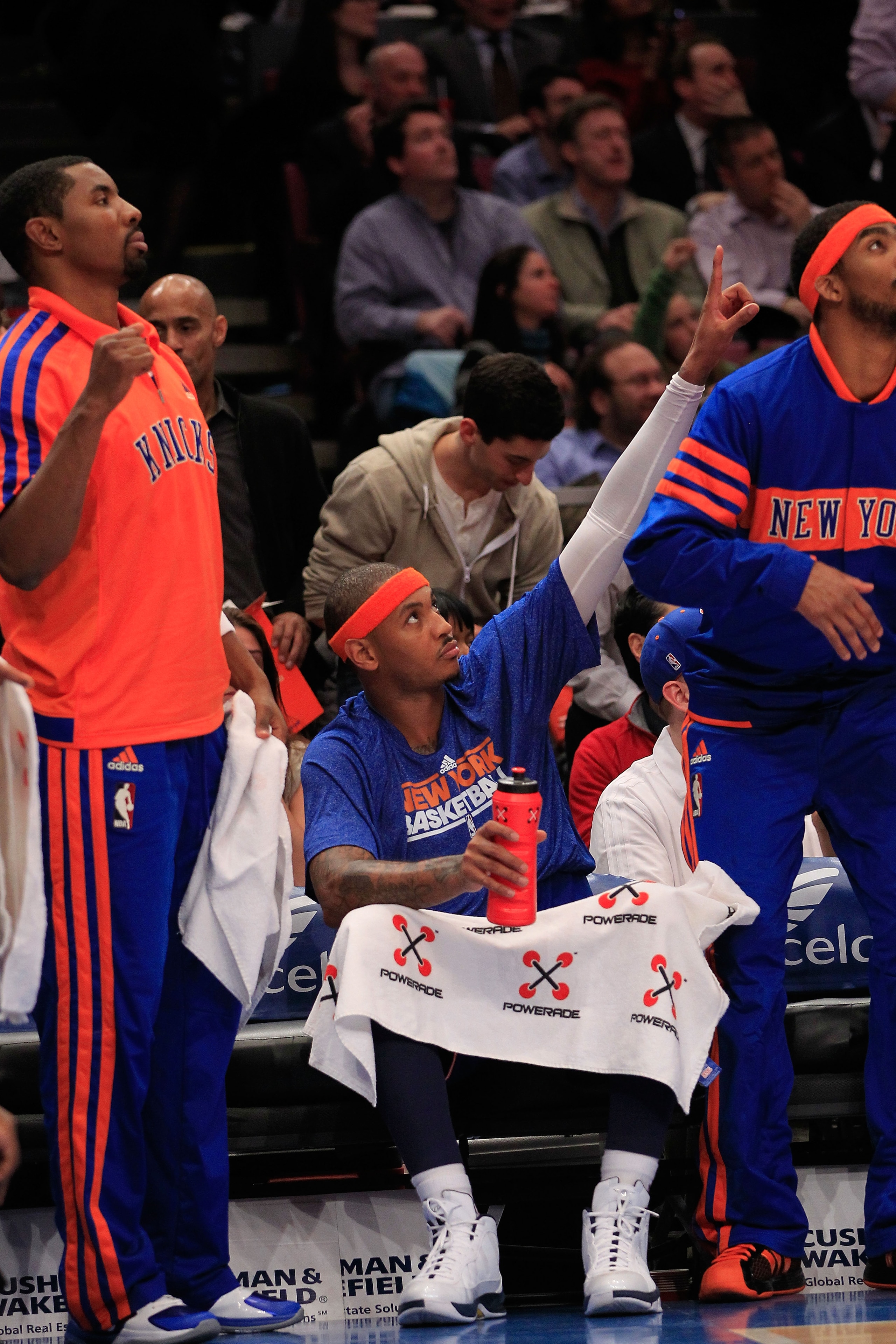 NEW YORK, NY - FEBRUARY 23: Carmelo Anthony #7 of the New York Knicks gestures from the bench during the game against the Milwaukee Bucks at Madison Square Garden on February 23, 2011 in New York City. NOTE TO USER: User expressly acknowledges and agrees NEW YORK, NY - FEBRUARY 23: Carmelo Anthony #7 of the New York Knicks gestures from the bench during the game against the Milwaukee Bucks at Madison Square Garden on February 23, 2011 in New York City. NOTE TO USER: User expressly acknowledges and agrees