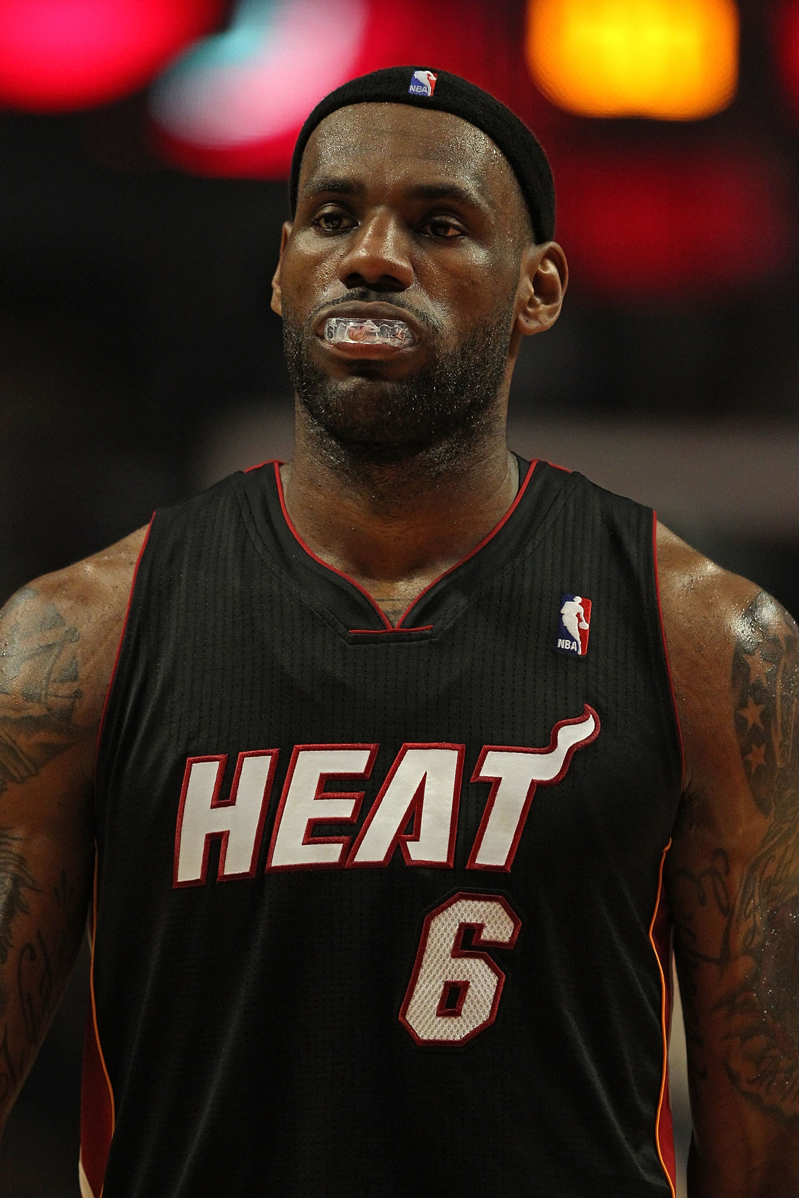 CHICAGO, IL - FEBRUARY 24: LeBron James #6 of the Miami Heat walks off of the court after a loss to the Chicago Bulls at the United Center on February 24, 2011 in Chicago, Illinois. The Bulls defeated the Heat 93-89. NOTE TO USER: User expressly acknowled CHICAGO, IL - FEBRUARY 24: LeBron James #6 of the Miami Heat walks off of the court after a loss to the Chicago Bulls at the United Center on February 24, 2011 in Chicago, Illinois. The Bulls defeated the Heat 93-89. NOTE TO USER: User expressly acknowled