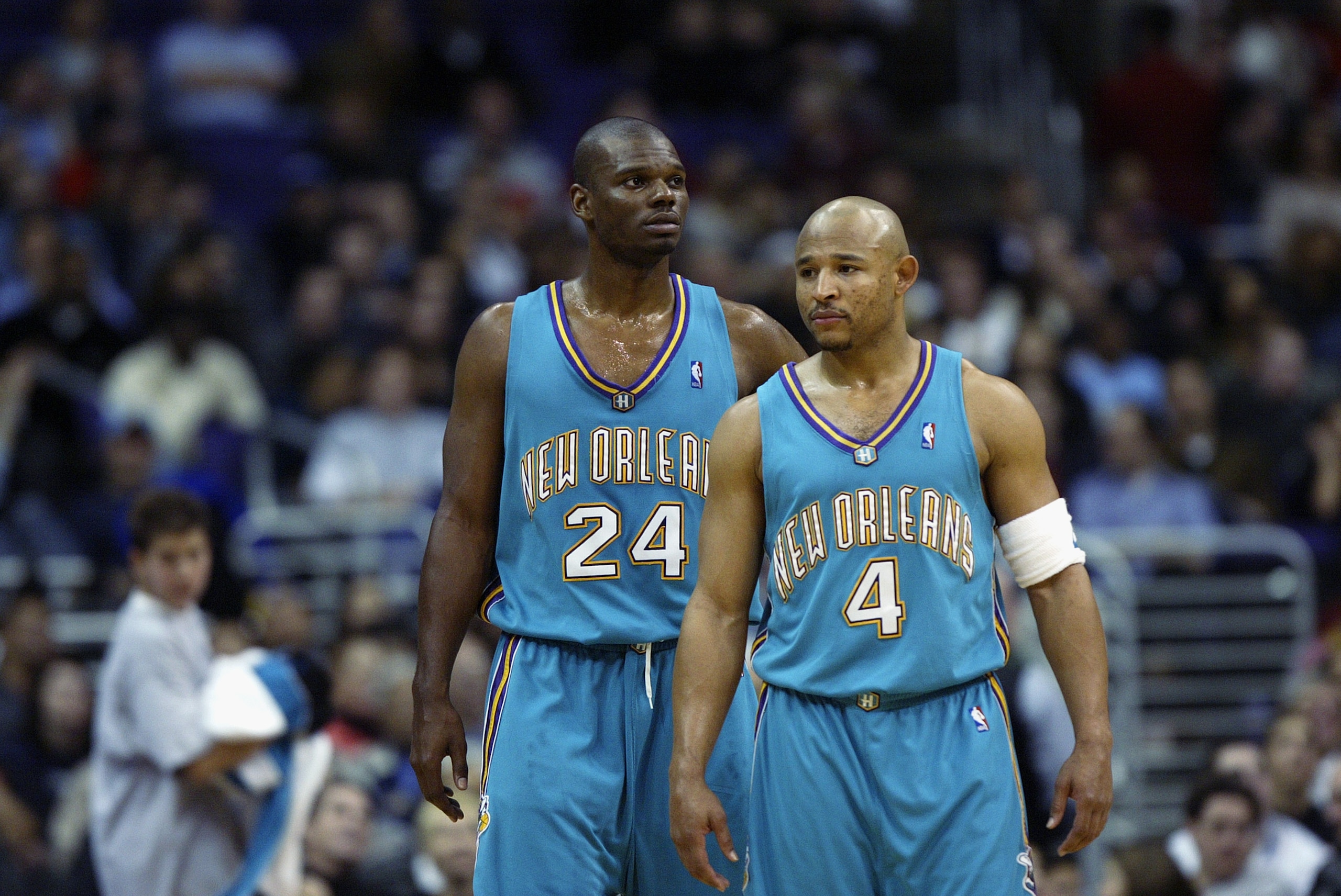 LOS ANGELES - MARCH 3:  David Wesley #4 and Jamal Mashburn #24 of the New Orleans Hornets during the NBA game against the Los Angeles Clippers on March 3, 2003 at Staples Center in Los Angeles, California.  The Hornets won 111-108.  NOTE TO USER: User exp