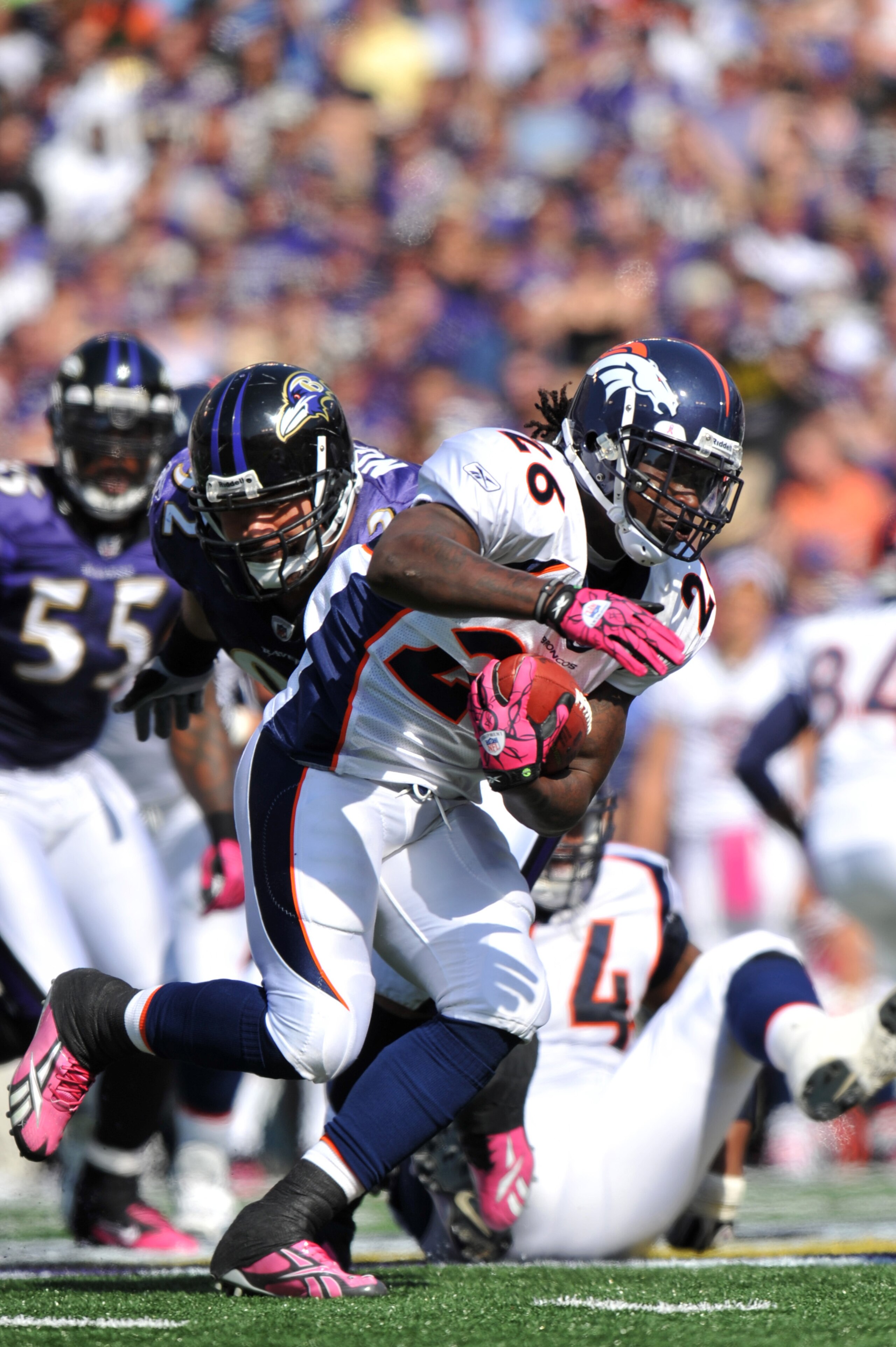 BALTIMORE, MD - OCTOBER 10: Laurence Maroney #26 of the Denver Broncos runs the ball against the Baltimore Ravens at M&T Bank Stadium on October 10, 2010 in Baltimore, Maryland. Players wore pink in recognition of Breast Cancer Awareness Month. The Ravens