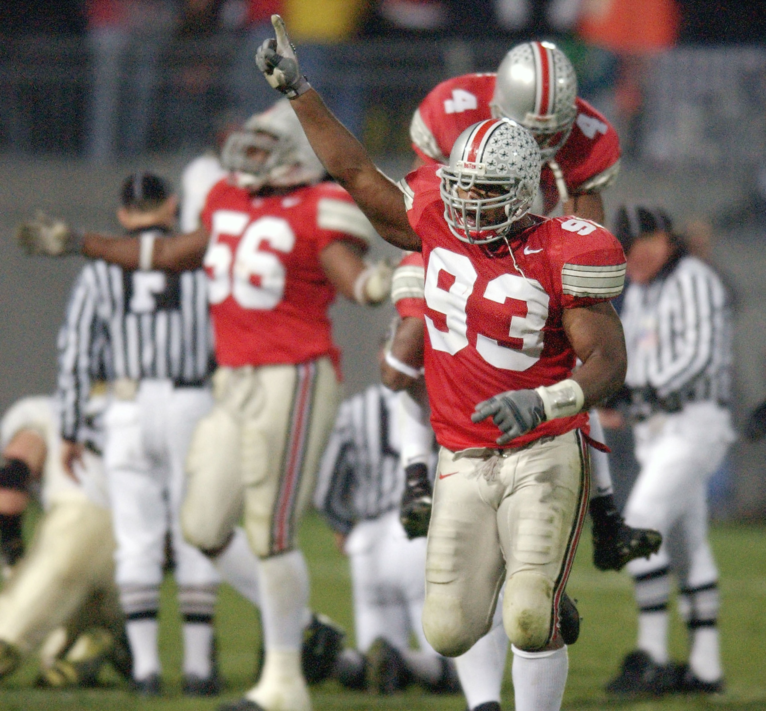 COLUMBUS, OH - NOVEMBER 15:  Defensive end Will Smith #93 of the Ohio State Buckeyes celebrates against the Purdue Boilermakers on November 15, 2003 at Ohio Stadium in Columbus, Ohio. Ohio State defeated Purdue 16-13 in overtime. (Photo by David Maxwell/G