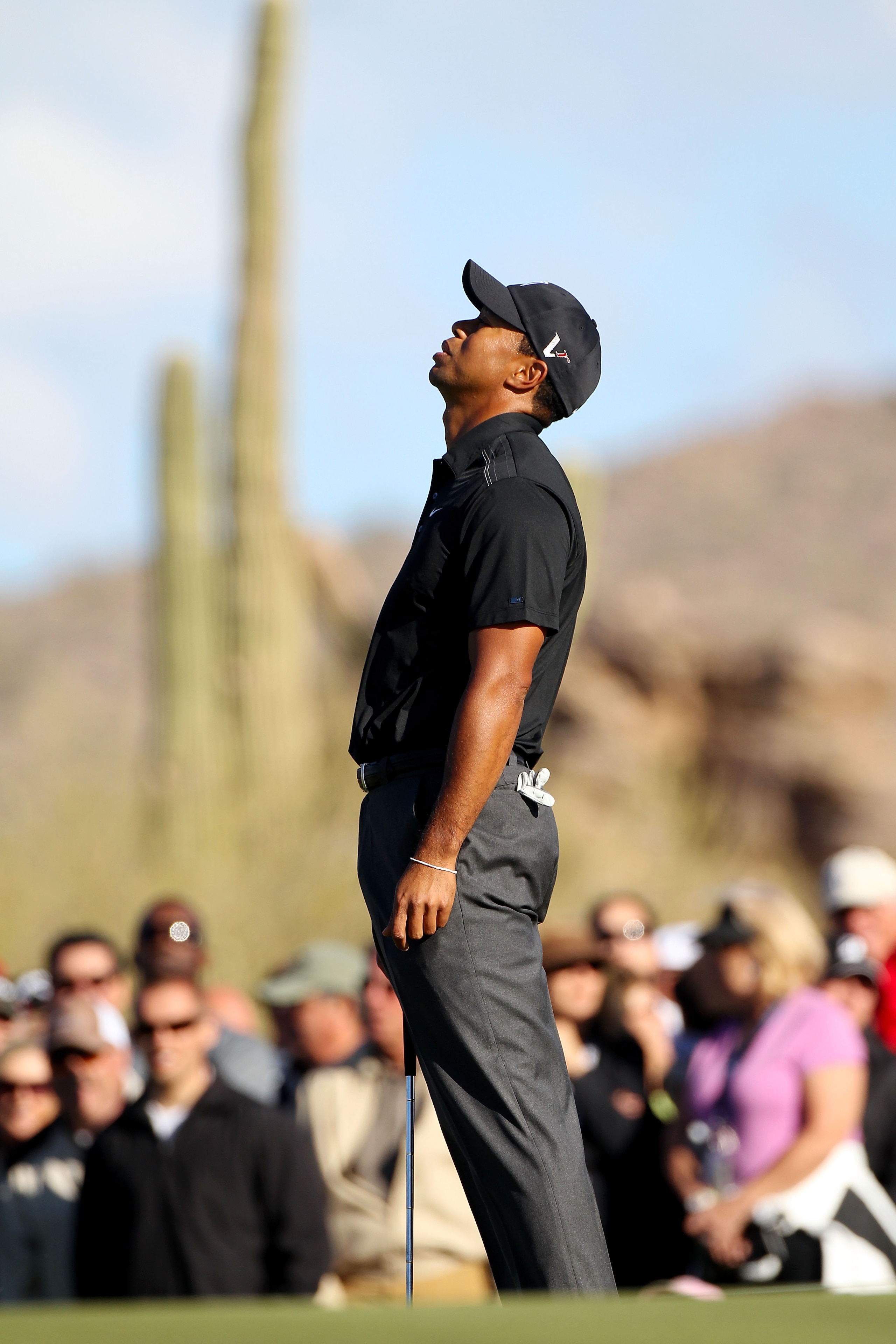 MARANA, AZ - FEBRUARY 23:  Tiger Woods reacts on the 17th hole during the first round of the Accenture Match Play Championship at the Ritz-Carlton Golf Club on February 23, 2011 in Marana, Arizona.  (Photo by Sam Greenwood/Getty Images)