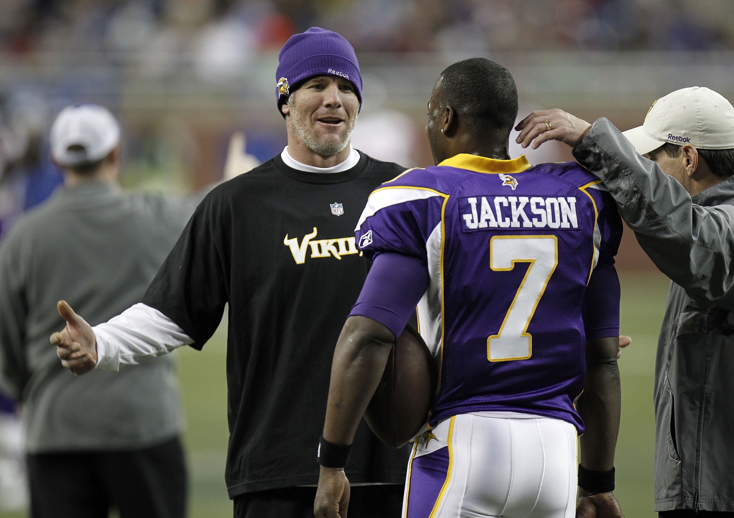 DETROIT, MI - DECEMBER 13:  Brett Favre #4 of the Minnesota Vikings talks with Tarvaris Jackson #7 during warm ups prior to playing the New York Giants at Ford Field on December 13, 2010 in Detroit, Michigan.  (Photo by Gregory Shamus/Getty Images)