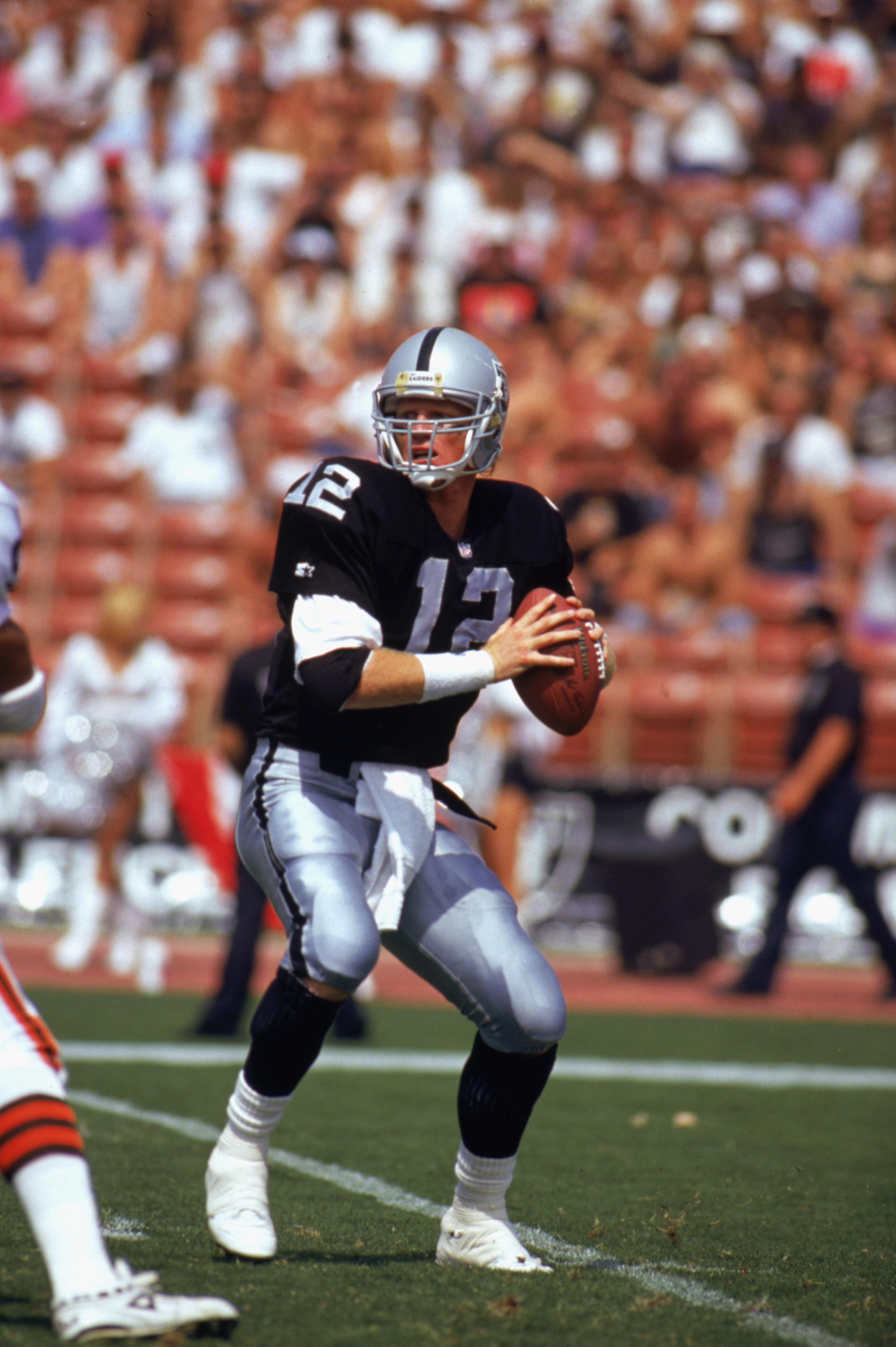 LOS ANGELES -SEPTEMBER 20:  Todd Marinovich #12 of the Los Angeles Raiders looks to pass during the game against the Cleveland Browns at Los Angeles Coliseum on September 20, 1992 in Los Angeles, California. The Browns won 28-16. (Photo by: Ken Levine/Get