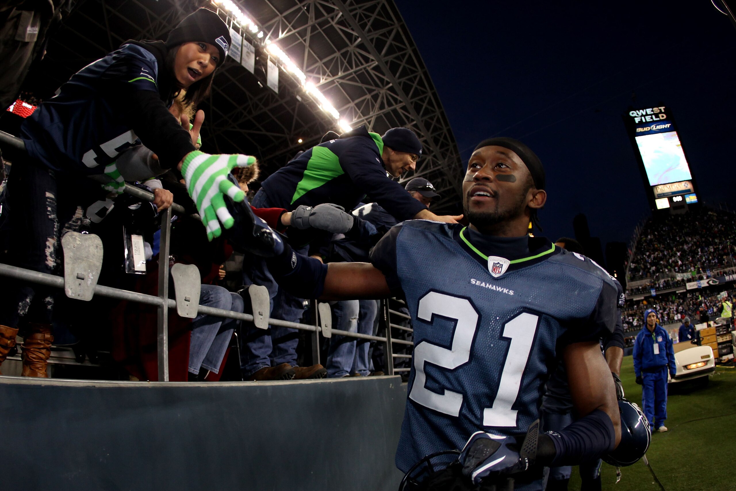 SEATTLE, WA - JANUARY 08:  Kelly Jennings #21 of the Seattle Seahawks celebrates the Seahawks 41-36 victory against the New Orleans Saints during the 2011 NFC wild-card playoff game at Qwest Field on January 8, 2011 in Seattle, Washington.  (Photo by Otto