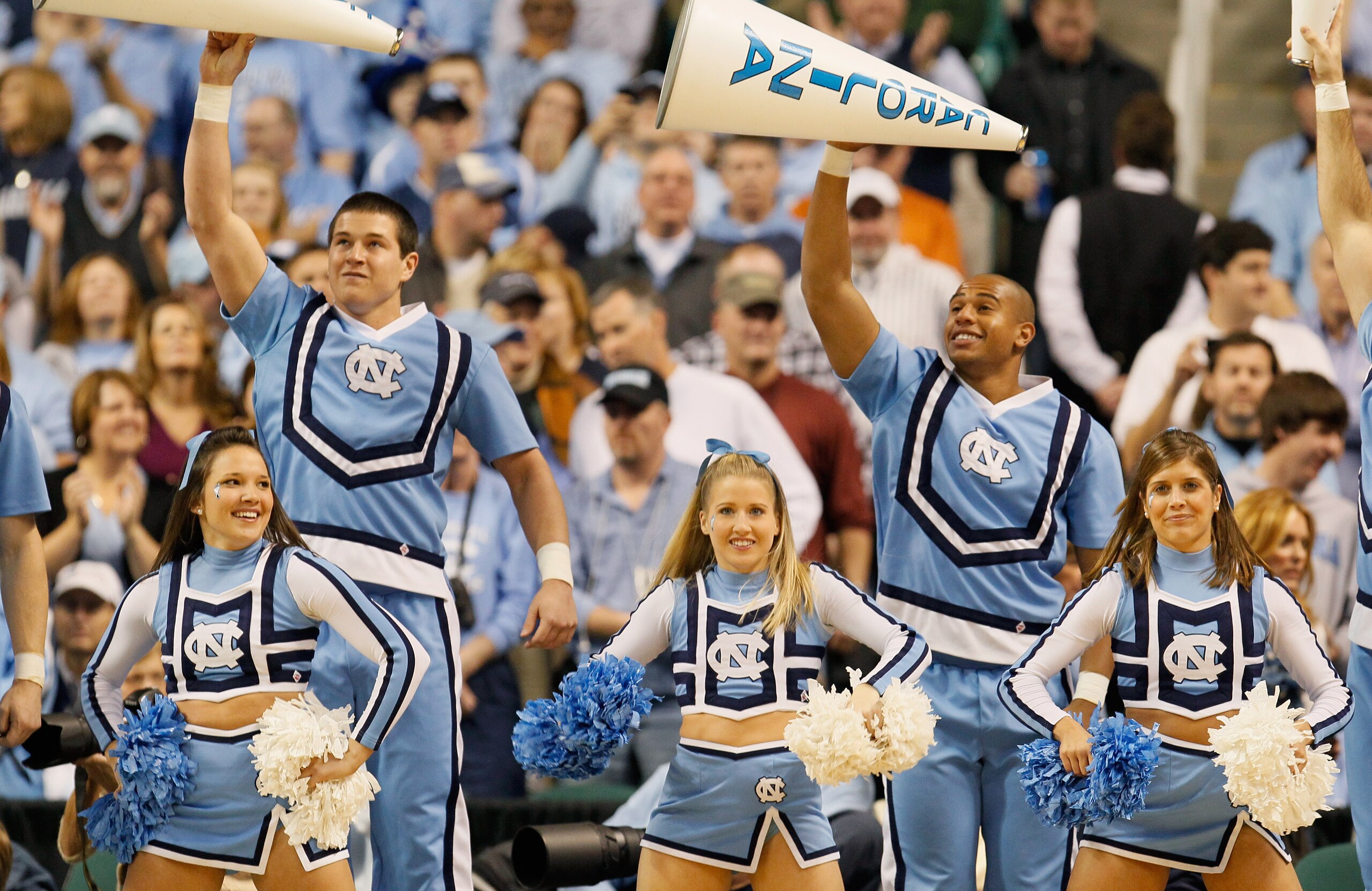 GREENSBORO, NC - DECEMBER 18:  Cheerleaders of the North Carolina Tar Heels perform against the Texas Longhorns at Greensboro Coliseum on December 18, 2010 in Greensboro, North Carolina.  (Photo by Kevin C. Cox/Getty Images)
