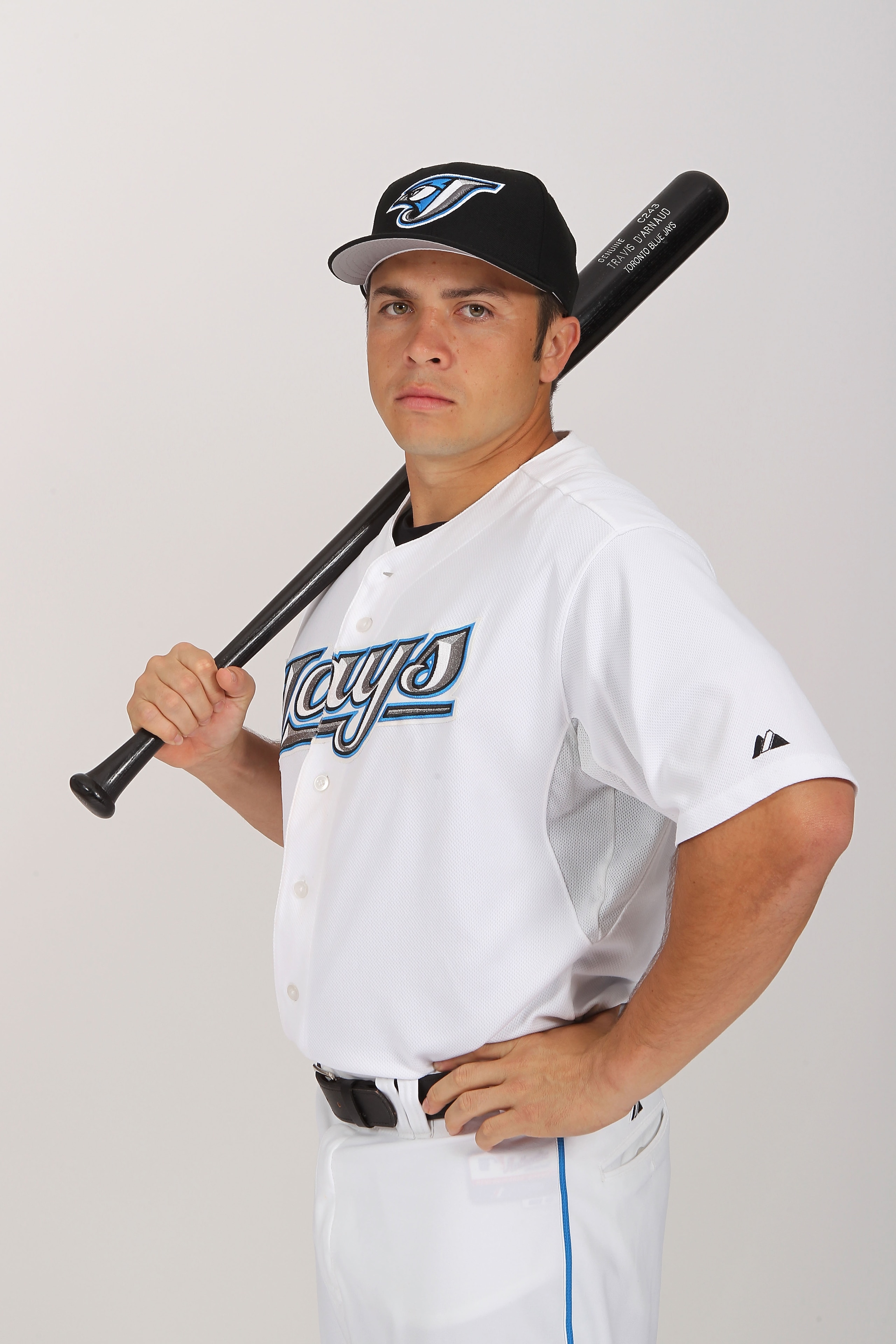 DUNEDIN, FL - FEBRUARY 20:  Travis d'Arnaud #15 of the Toronto Blue Jays poses during photo day at Florida Auto Exchange Stadium on February 20, 2011 in Dunedin, Florida.  (Photo by Nick Laham/Getty Images)