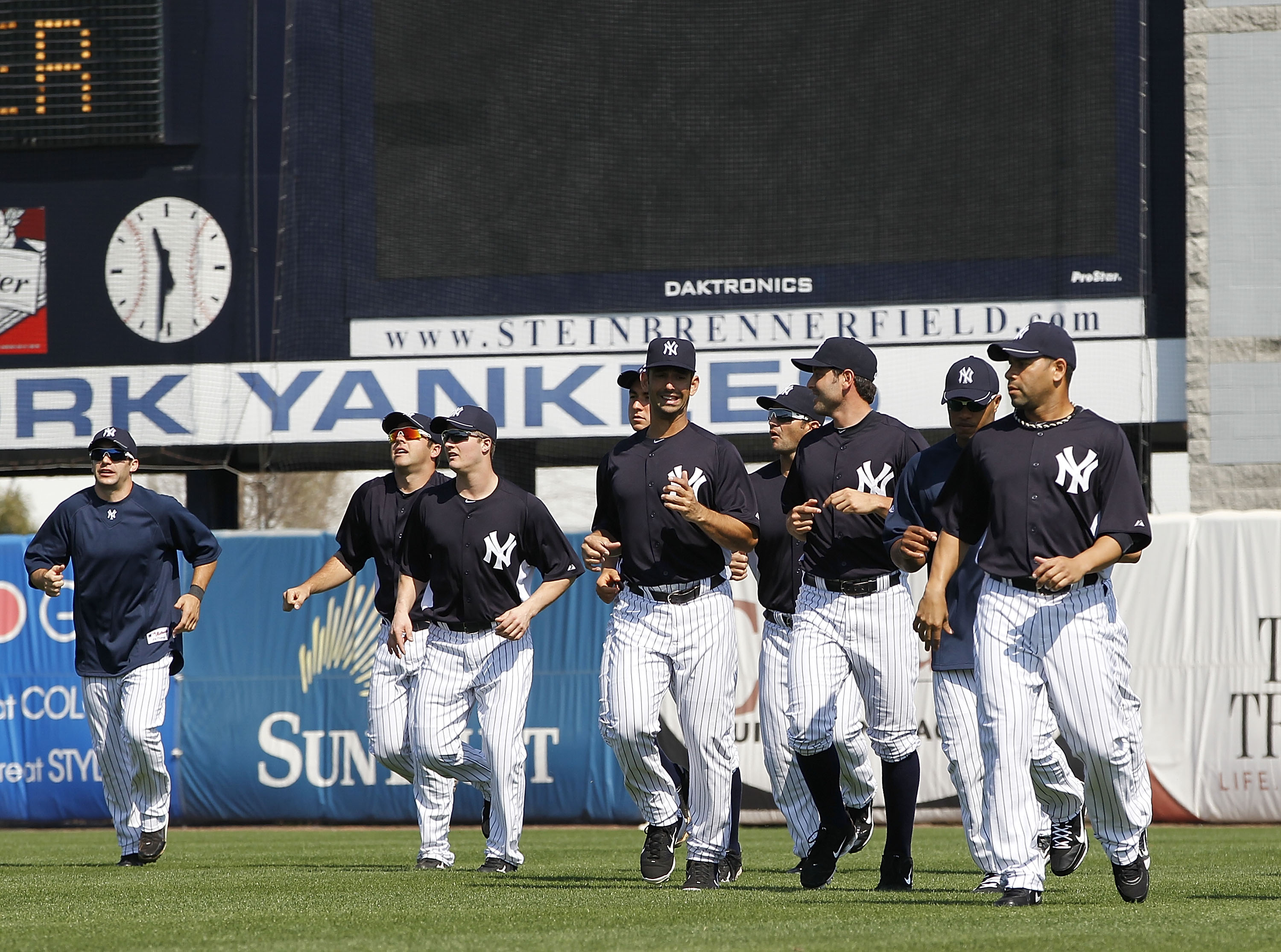 TAMPA, FL - FEBRUARY 20:  The New York Yankees warm up prior to the start of the first full team workout of Spring Training on February 20, 2011 at the George M. Steinbrenner Field in Tampa, Florida.  (Photo by Leon Halip/Getty Images)