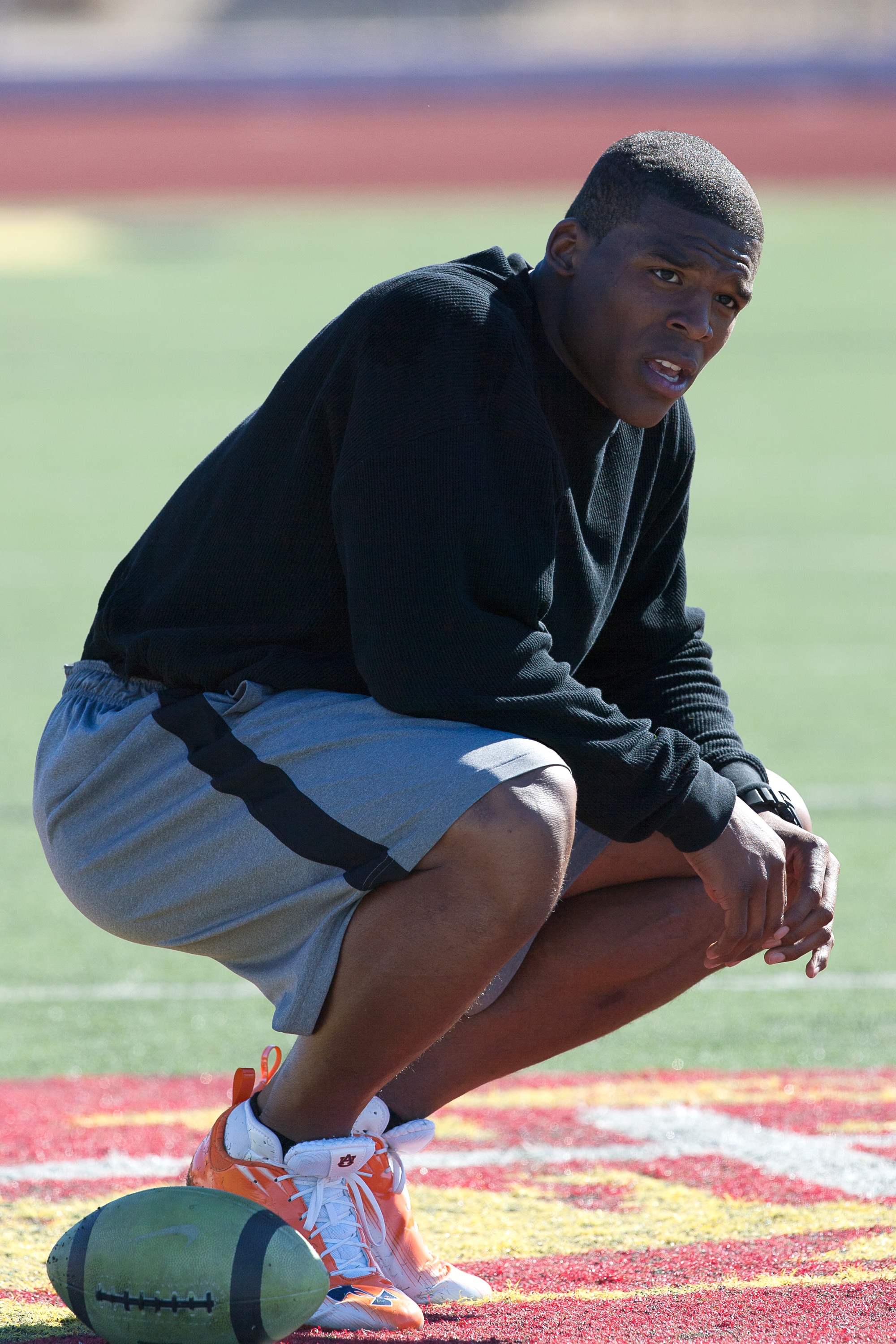 SAN DIEGO, CA - FEBRUARY 10: 2010 Heisman Trophy winning quarterback Cam Newton of Auburn pauses during his workout routine for the media at Cathedral High School's sports stadium on February 10, 2011 in San Diego, California. (Photo by Kent Horner/ Getty SAN DIEGO, CA - FEBRUARY 10: 2010 Heisman Trophy winning quarterback Cam Newton of Auburn pauses during his workout routine for the media at Cathedral High School's sports stadium on February 10, 2011 in San Diego, California. (Photo by Kent Horner/ Getty