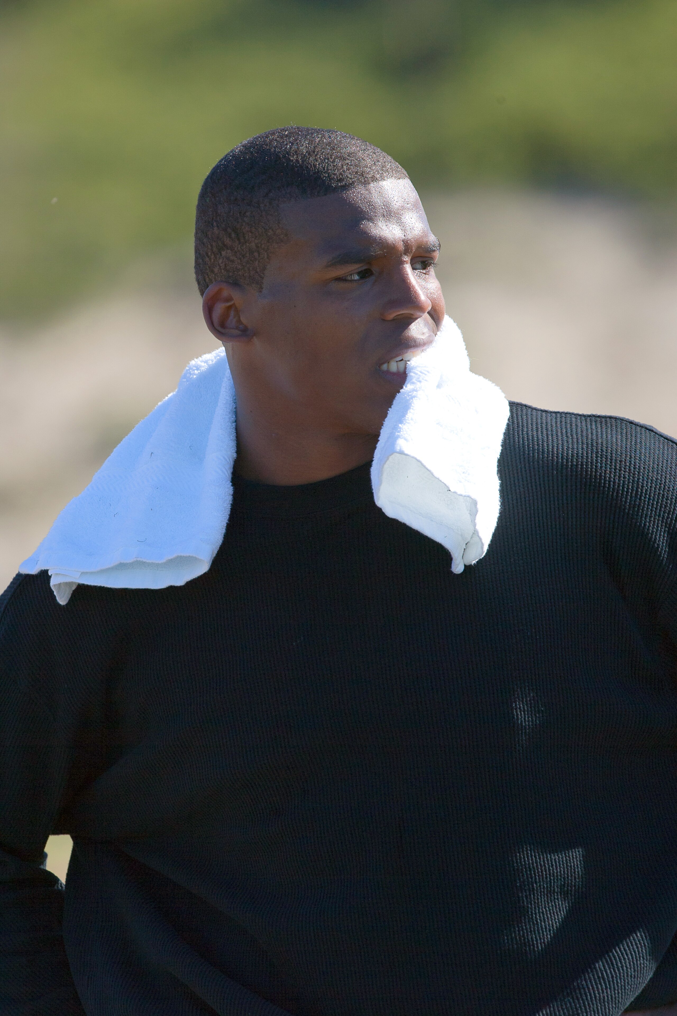 SAN DIEGO, CA - FEBRUARY 10:  2010 Heisman Trophy winning quarterback Cam Newton of the Auburn Tigers goes through his workout routine for the media at Cathedral High School's sports stadium on February 10, 2011 in San Diego, California.  (Photo by Kent H