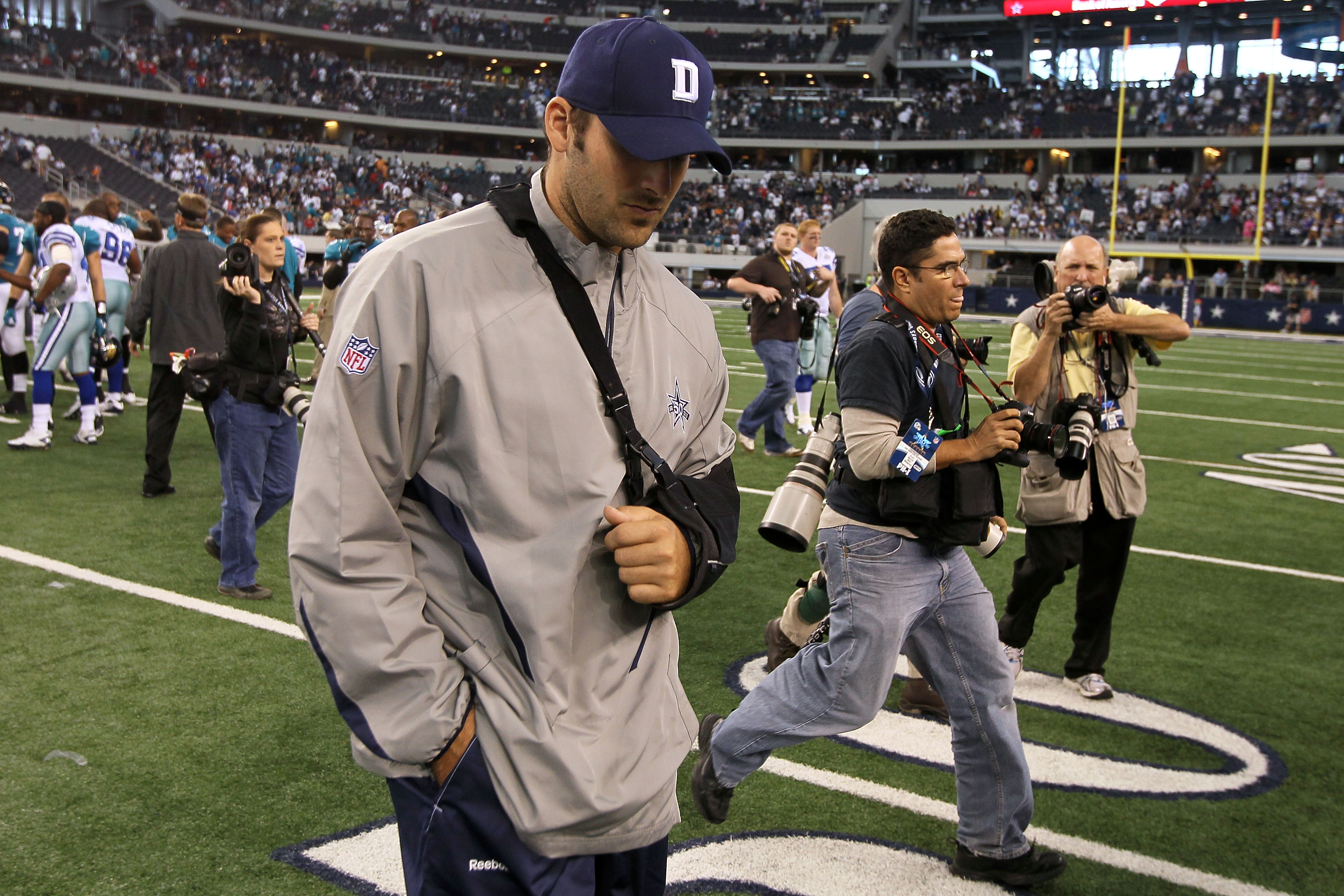 30 Aug 2004 - Tony Romo (9) of the Dallas Cowboys turns to hand off in the