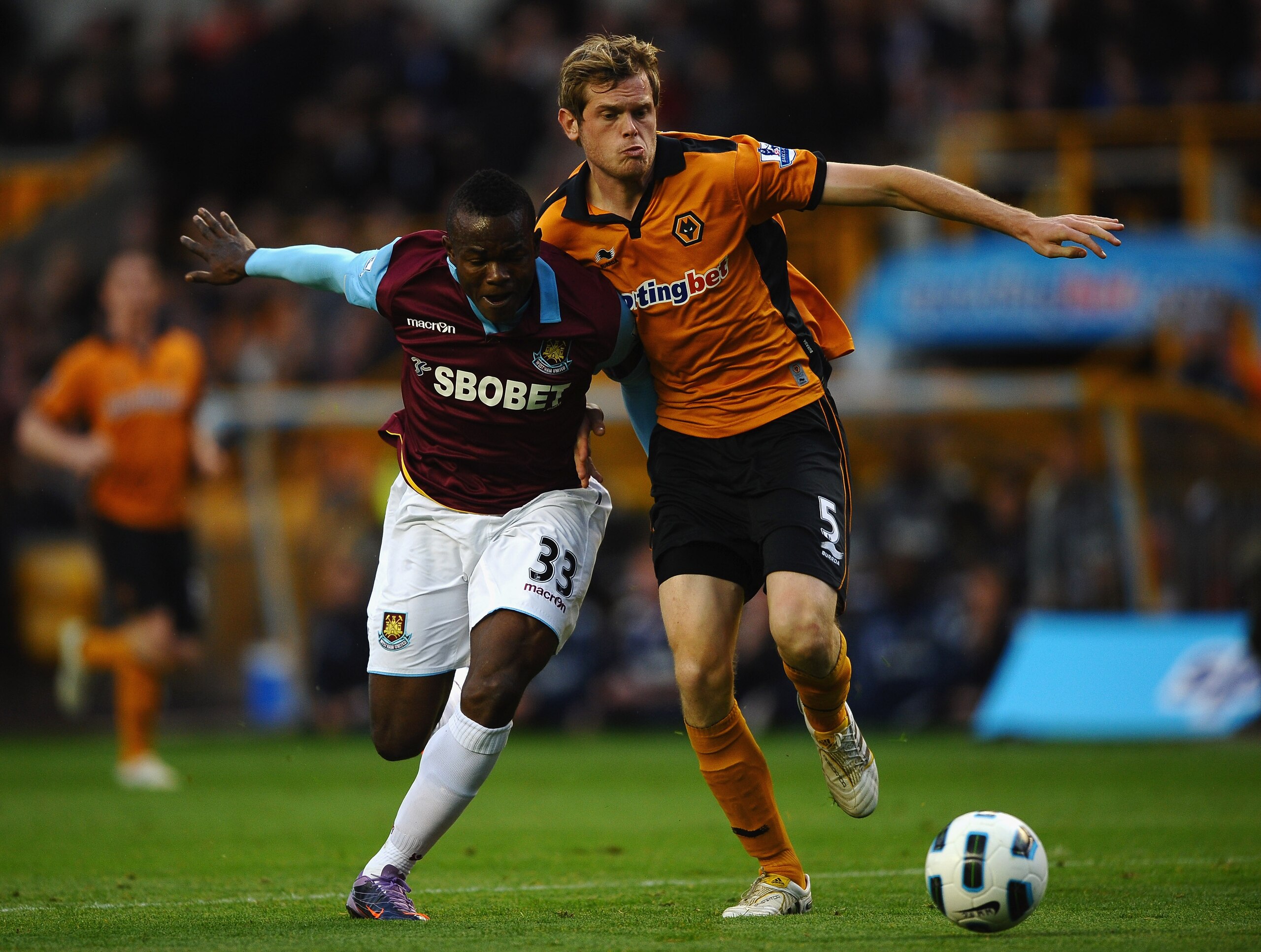 WOLVERHAMPTON, ENGLAND - OCTOBER 16: Victor Oninna of West Ham battles wor the ball with Richard Stearman of Wolves during the Barclays Premier League match between Wolverhampton Wanderers and West Ham United at Molineux on October 16, 2010 in Wolverhampt