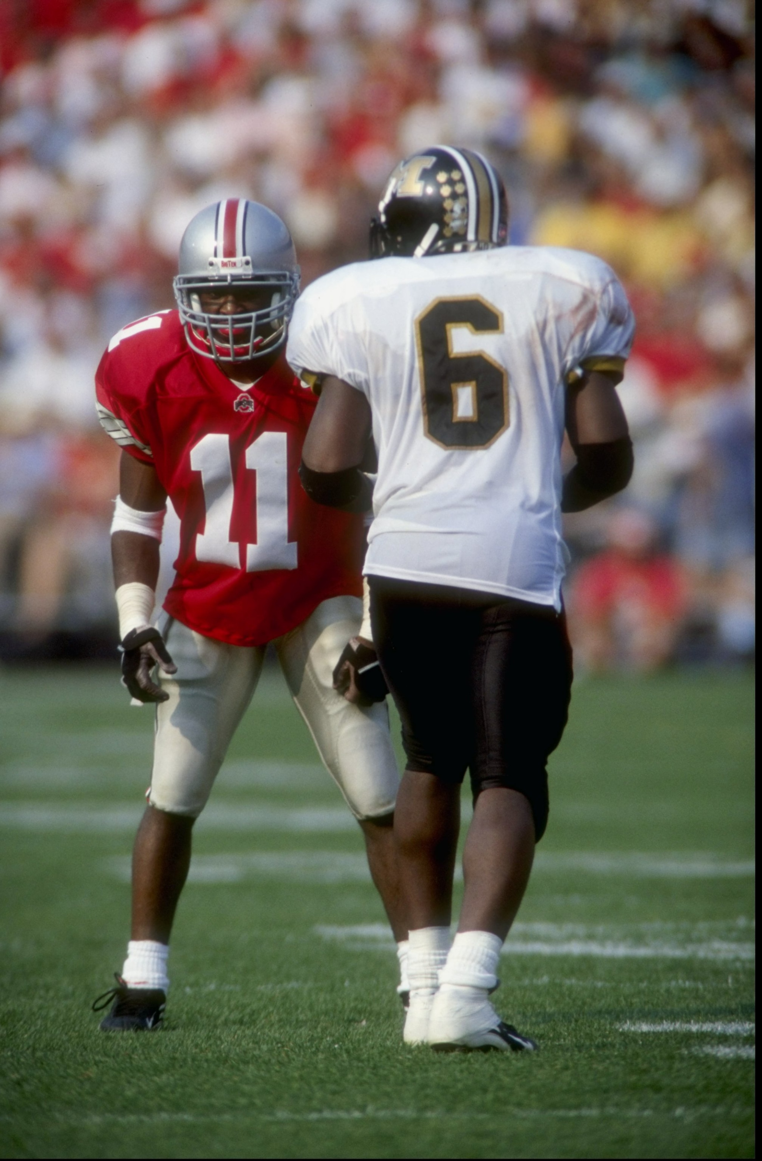 19 Sep 1998:  Cornerback Antoine Winfield #11 of the Ohio State Buckeyes in action against wide receiver Kareem Wise #6 of the Misourri Tigers during the game at the Ohio Stadium in Columbus, Ohio. The Buckeyes defeated the Tigers 35-14. Mandatory Credit: