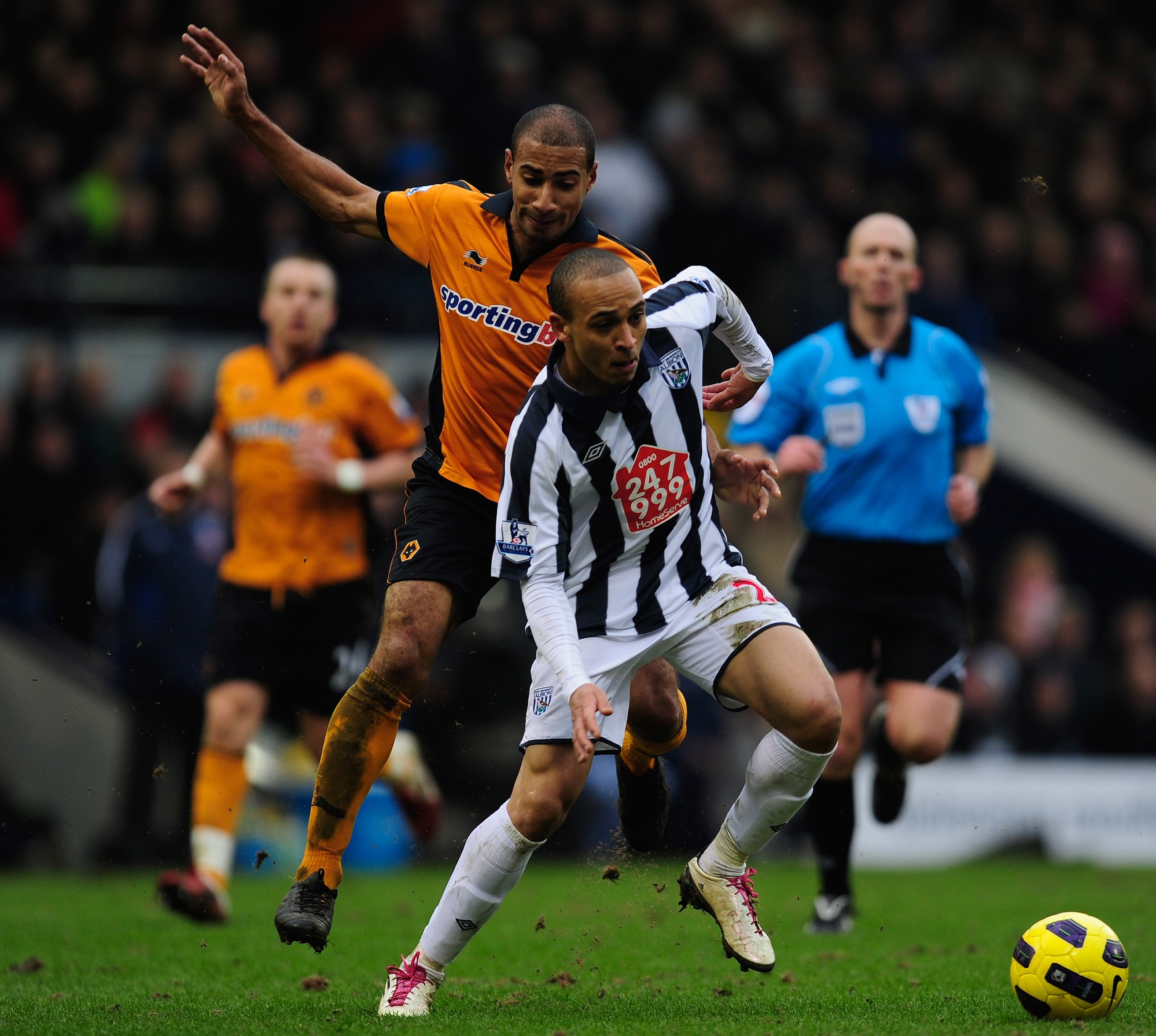 WEST BROMWICH, ENGLAND - FEBRUARY 20:  Karl Henry of Wolverhampton Wanderers battles with Peter Odemwingie of West Bromwich Albion during the Barclays Premier League match between West Bromwich Albion and Wolverhampton Wanderers at The Hawthorns on Februa