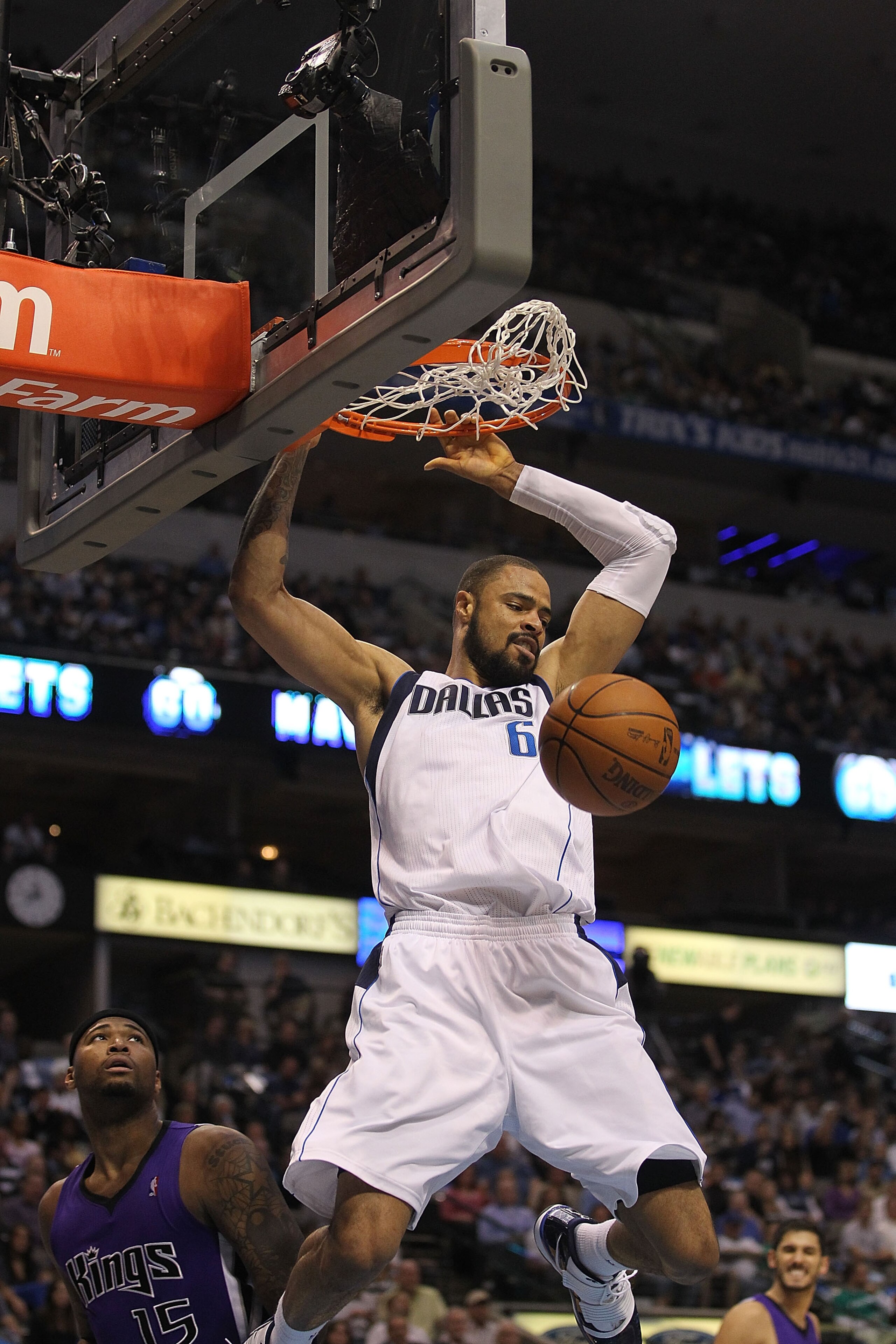 DALLAS, TX - FEBRUARY 16:   Center Tyson Chandler #6 of the Dallas Mavericks makes the slam dunk against the Sacramento Kings at American Airlines Center on February 16, 2011 in Dallas, Texas.  NOTE TO USER: User expressly acknowledges and agrees that, by