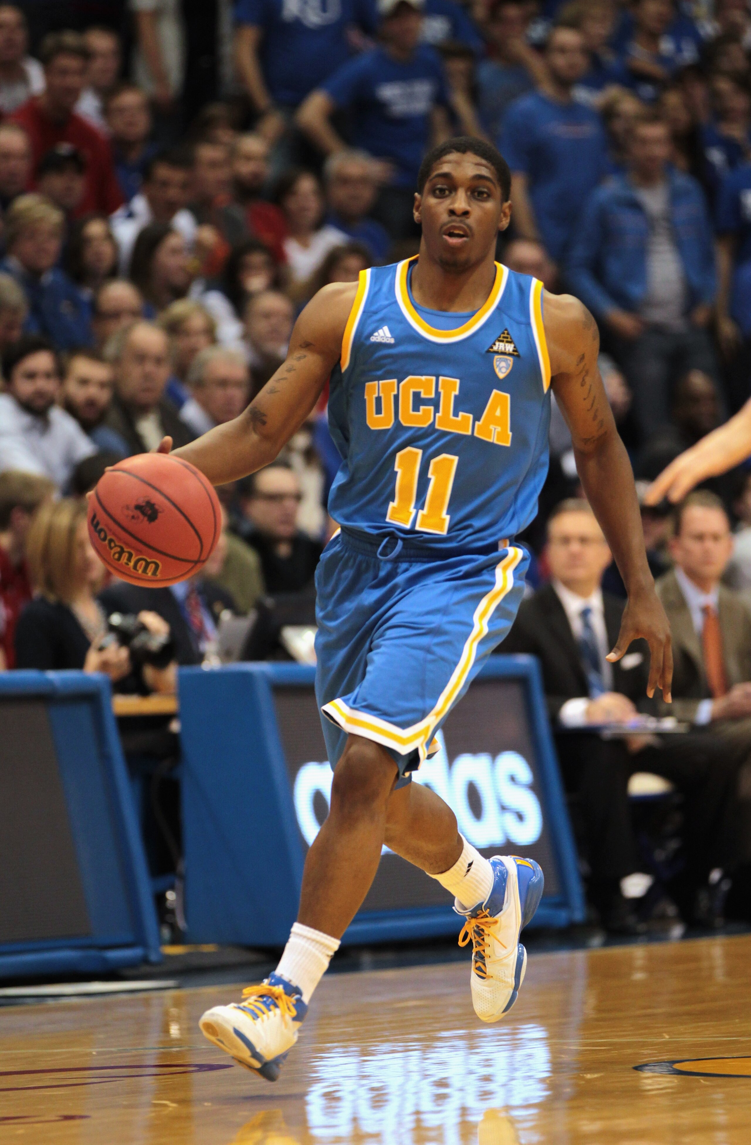 LAWRENCE, KS - DECEMBER 02:  Lazeric Jones #11 of the UCLA Bruins in action during the game against the Kansas Jayhawks on December 2, 2010 at Allen Fieldhouse in Lawrence, Kansas.  (Photo by Jamie Squire/Getty Images)
