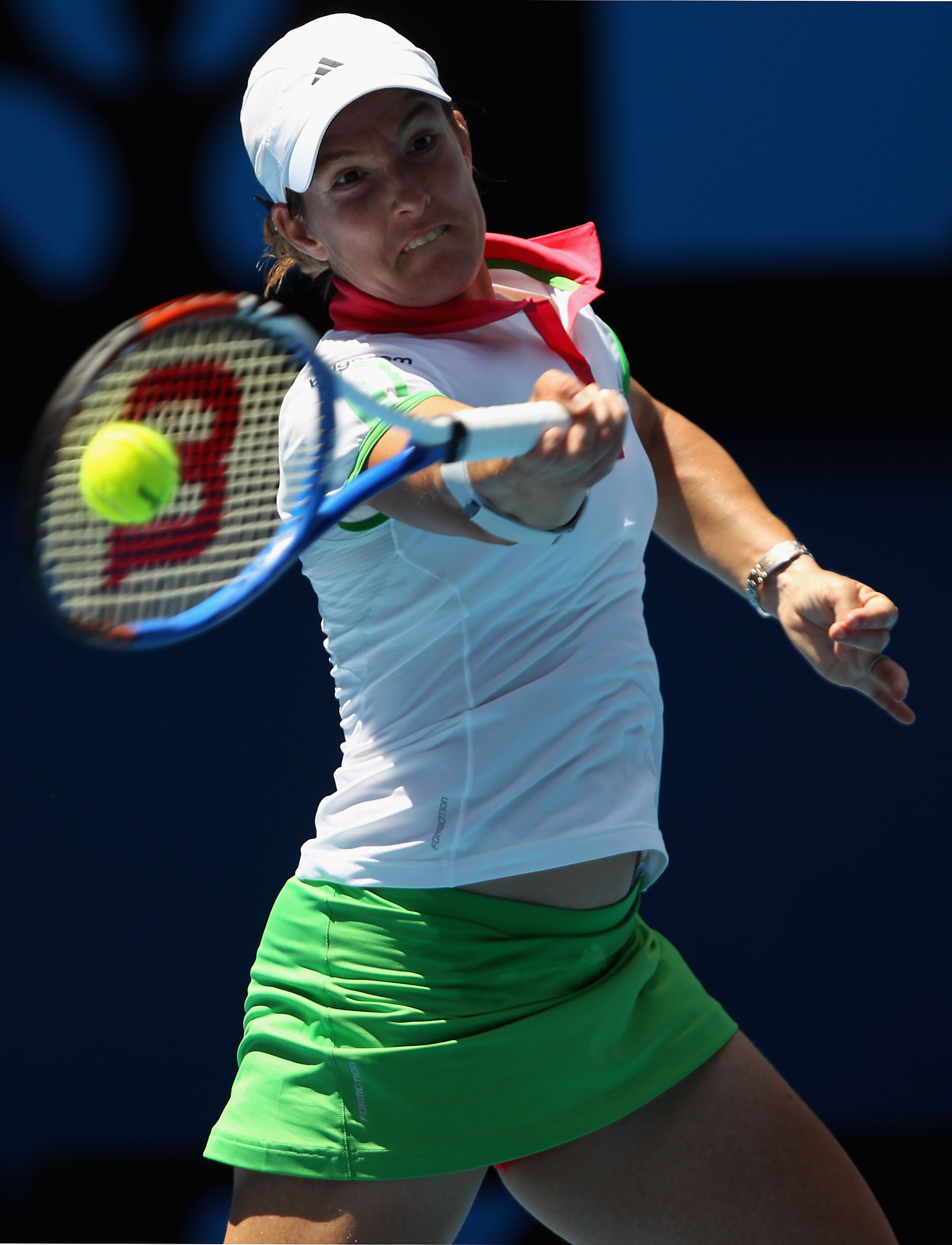 MELBOURNE, AUSTRALIA - JANUARY 21:  Justine Henin of Belgium plays a forehand in her third round match against Svetlana Kuznetsova of Russia during day five of the 2011 Australian Open at Melbourne Park on January 21, 2011 in Melbourne, Australia.  (Photo