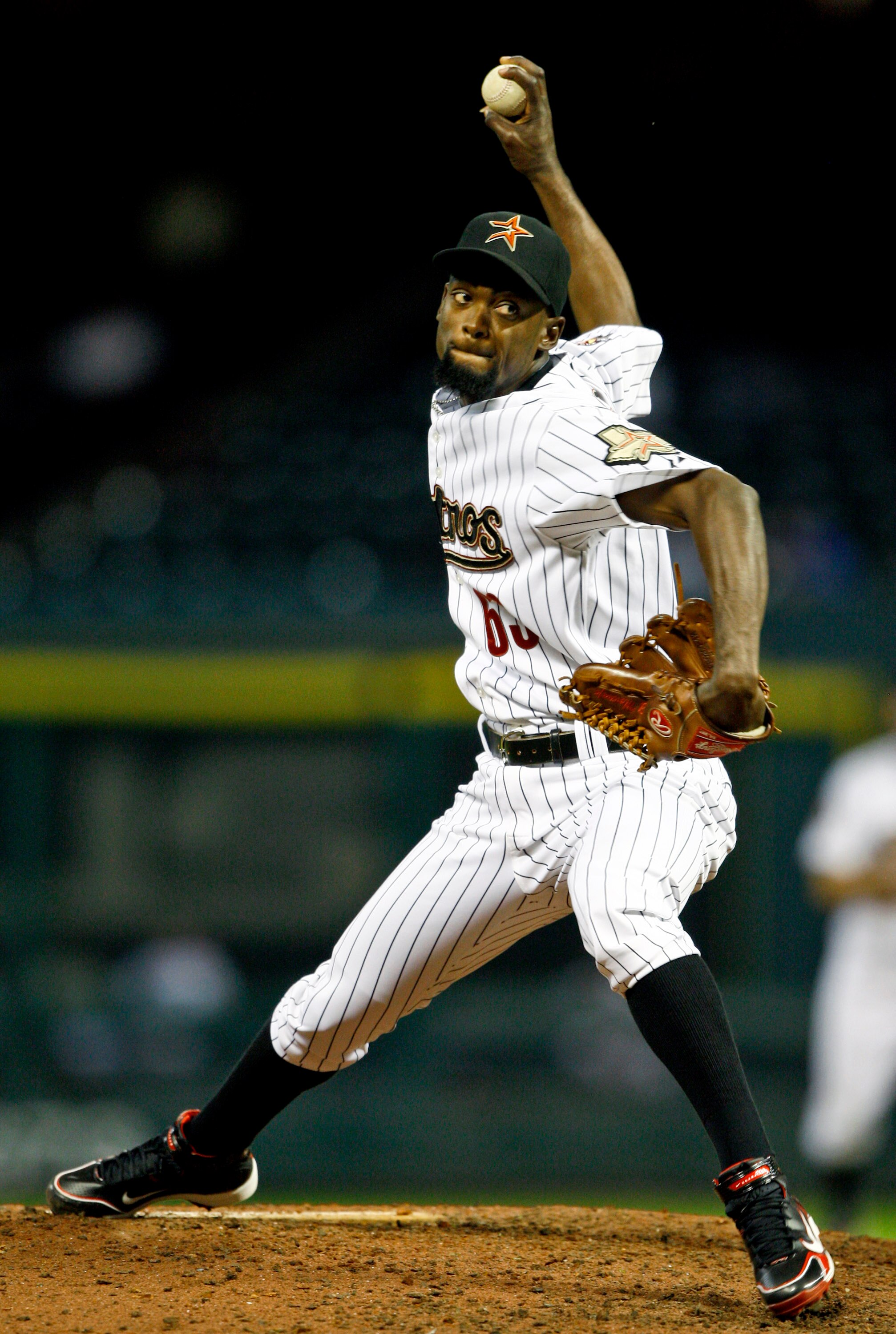 HOUSTON - APRIL 27:  Pitcher Sammy Gervacio #63 of the Houston Astros throws against the Cincinnati Reds in the eighth inning at Minute Maid Park on April 27, 2010 in Houston, Texas.  (Photo by Bob Levey/Getty Images)