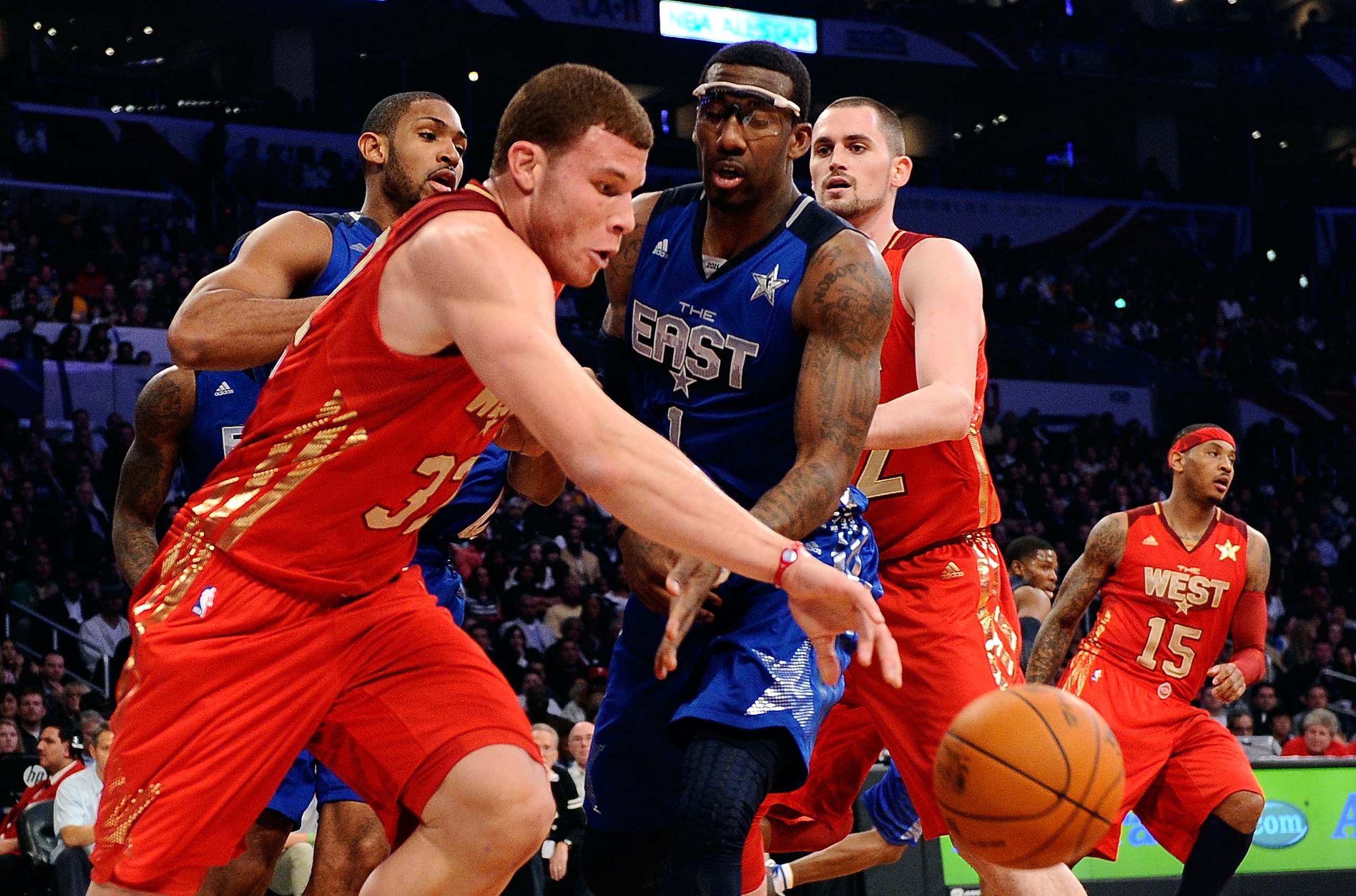 LOS ANGELES, CA - FEBRUARY 20: Blake Griffin #32 of the Los Angeles Clippers and the Western Conference moves the ball against Amare Stoudemire #1 of the New York Knicks and the Eastern Conference in the 2011 NBA All-Star Game at Staples Center on Februa LOS ANGELES, CA - FEBRUARY 20: Blake Griffin #32 of the Los Angeles Clippers and the Western Conference moves the ball against Amare Stoudemire #1 of the New York Knicks and the Eastern Conference in the 2011 NBA All-Star Game at Staples Center on Februa