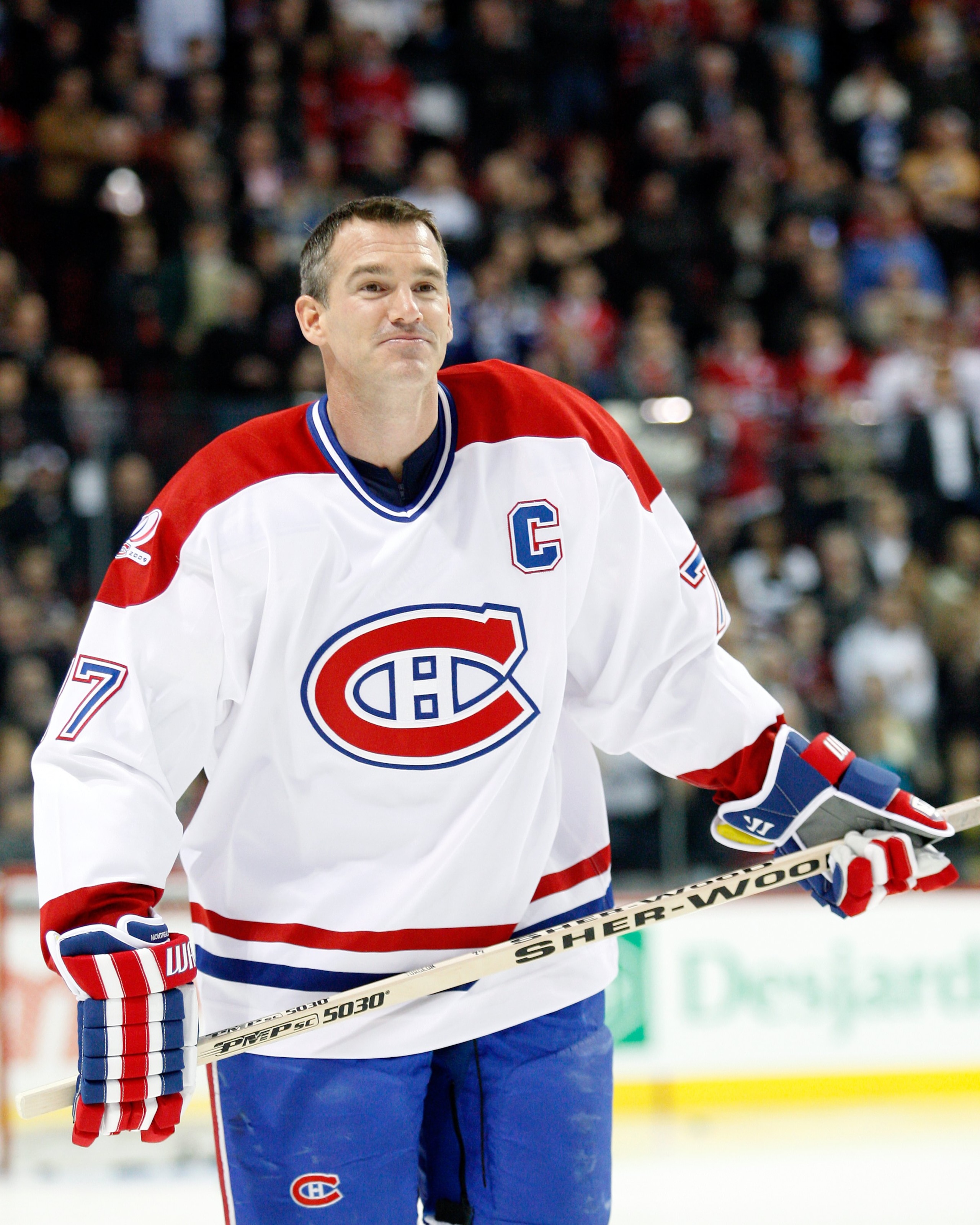 iMONTREAL- DECEMBER 4:  Former Montreal Canadien Pierre Turgeon skates during the Centennial Celebration ceremonies prior to the NHL game between the Montreal Canadiens and Boston Bruins on December 4, 2009 at the Bell Centre in Montreal, Quebec, Canada.