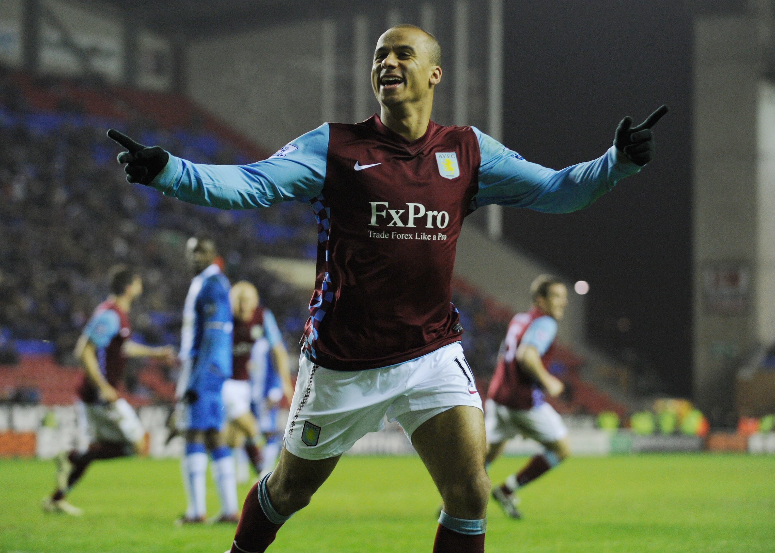 WIGAN, ENGLAND - JANUARY 25:  Gabriel Agbonlahor of Villa celebrates scoring the first goal during the Barclays Premier League match between Wigan Athletic and Aston Villa at the DW Stadium on January 25, 2011 in Wigan, England.  (Photo by Michael Regan/G