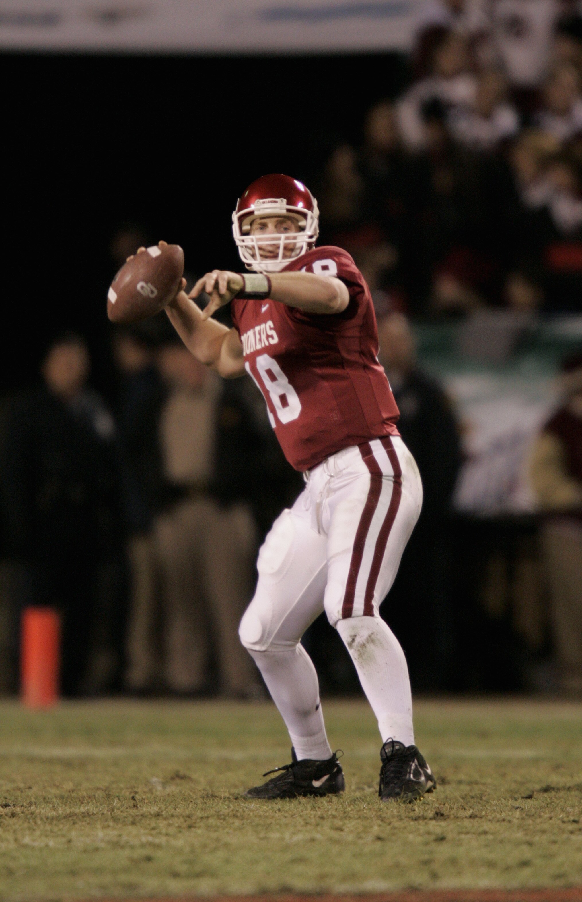 KANSAS CITY, MO - DECEMBER 4: Jason White #18 of the University of Oklahoma Sooners passes against the University of Colorado Buffaloes in the Big 12 Championship game on December 4, 2004 at Arrowhead Stadium in Kansas City, Missouri. Oklahoma defeated KANSAS CITY, MO - DECEMBER 4: Jason White #18 of the University of Oklahoma Sooners passes against the University of Colorado Buffaloes in the Big 12 Championship game on December 4, 2004 at Arrowhead Stadium in Kansas City, Missouri. Oklahoma defeated
