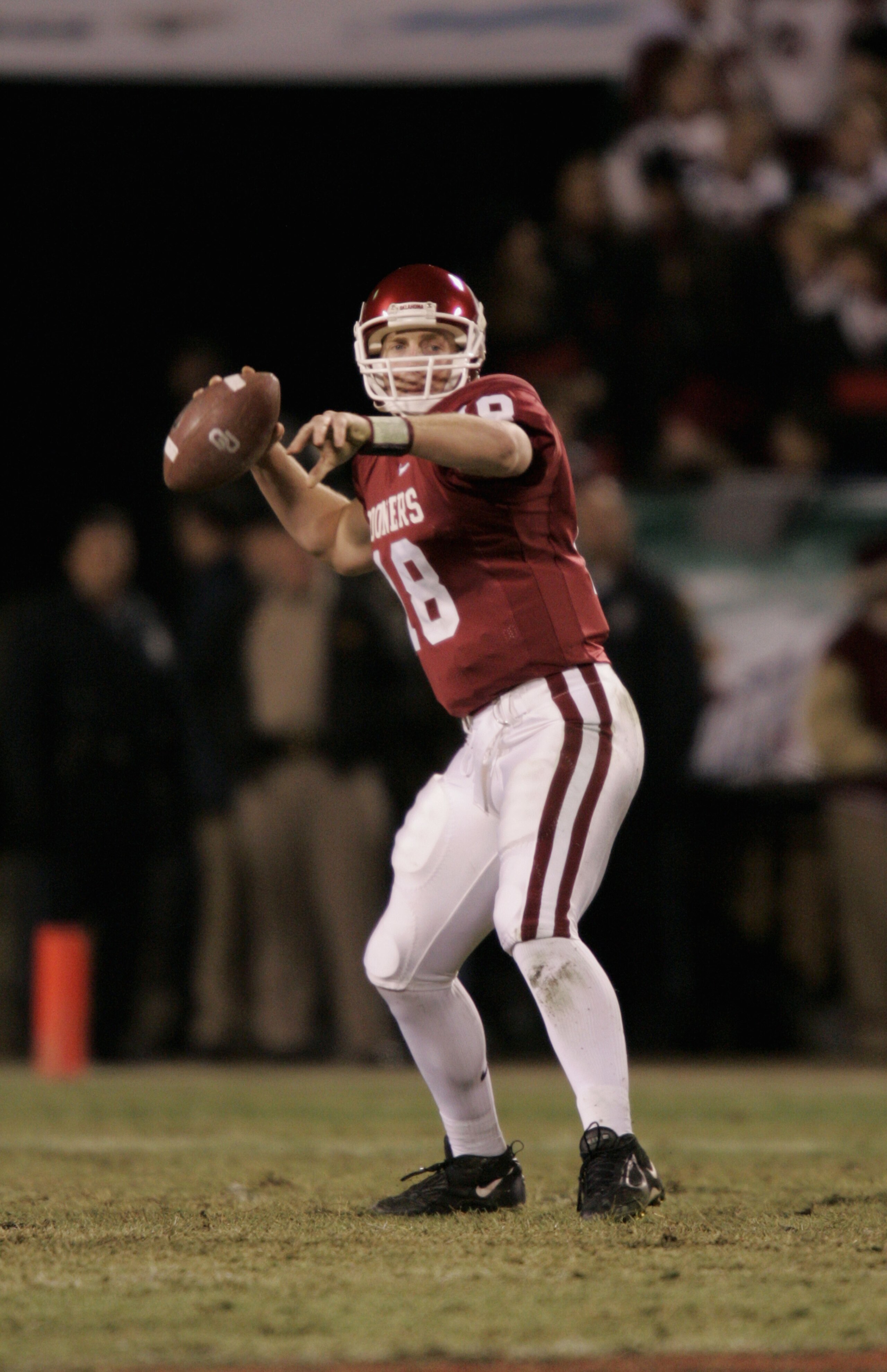 KANSAS CITY, MO - DECEMBER 4:  Jason White #18 of the University of Oklahoma Sooners passes against the University of Colorado Buffaloes in the Big 12 Championship game on December 4, 2004 at Arrowhead Stadium in Kansas City, Missouri.  Oklahoma defeated