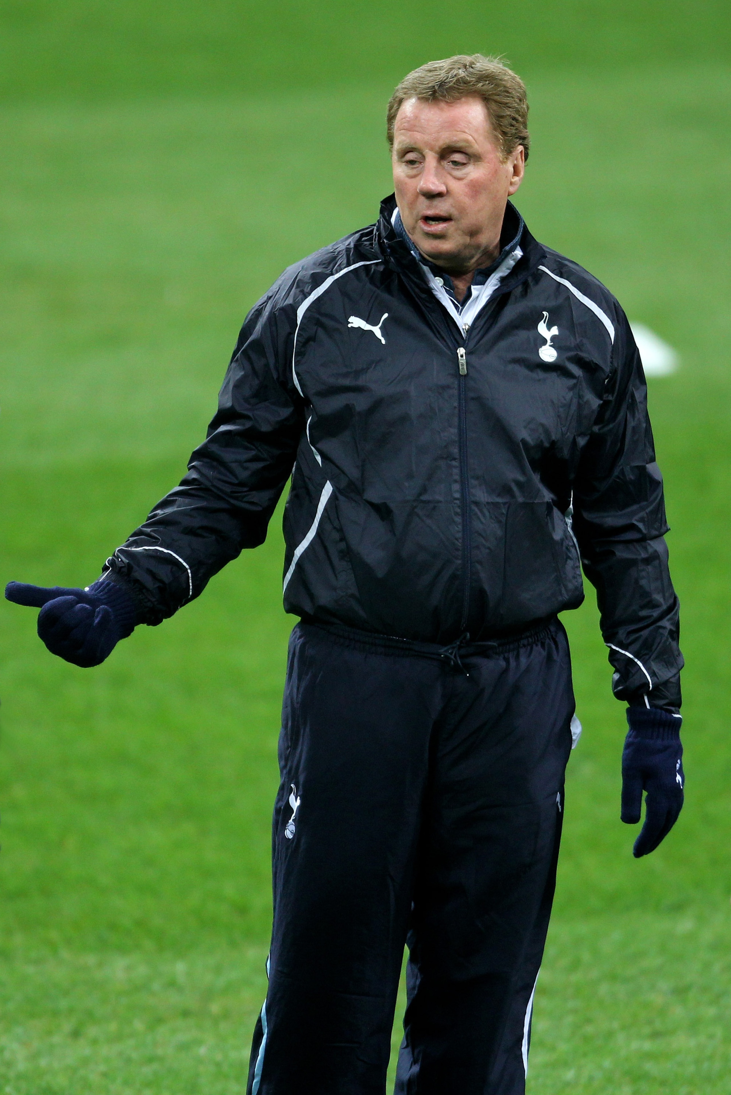 MILAN, ITALY - FEBRUARY 14:   Tottenham Hotspur Manager Harry Redknapp gestures during a training session on the day before the UEFA Champions League Round of 16, 1st leg match between AC Milan and Tottenham Hotspur at the San Siro Stadium on February 14,