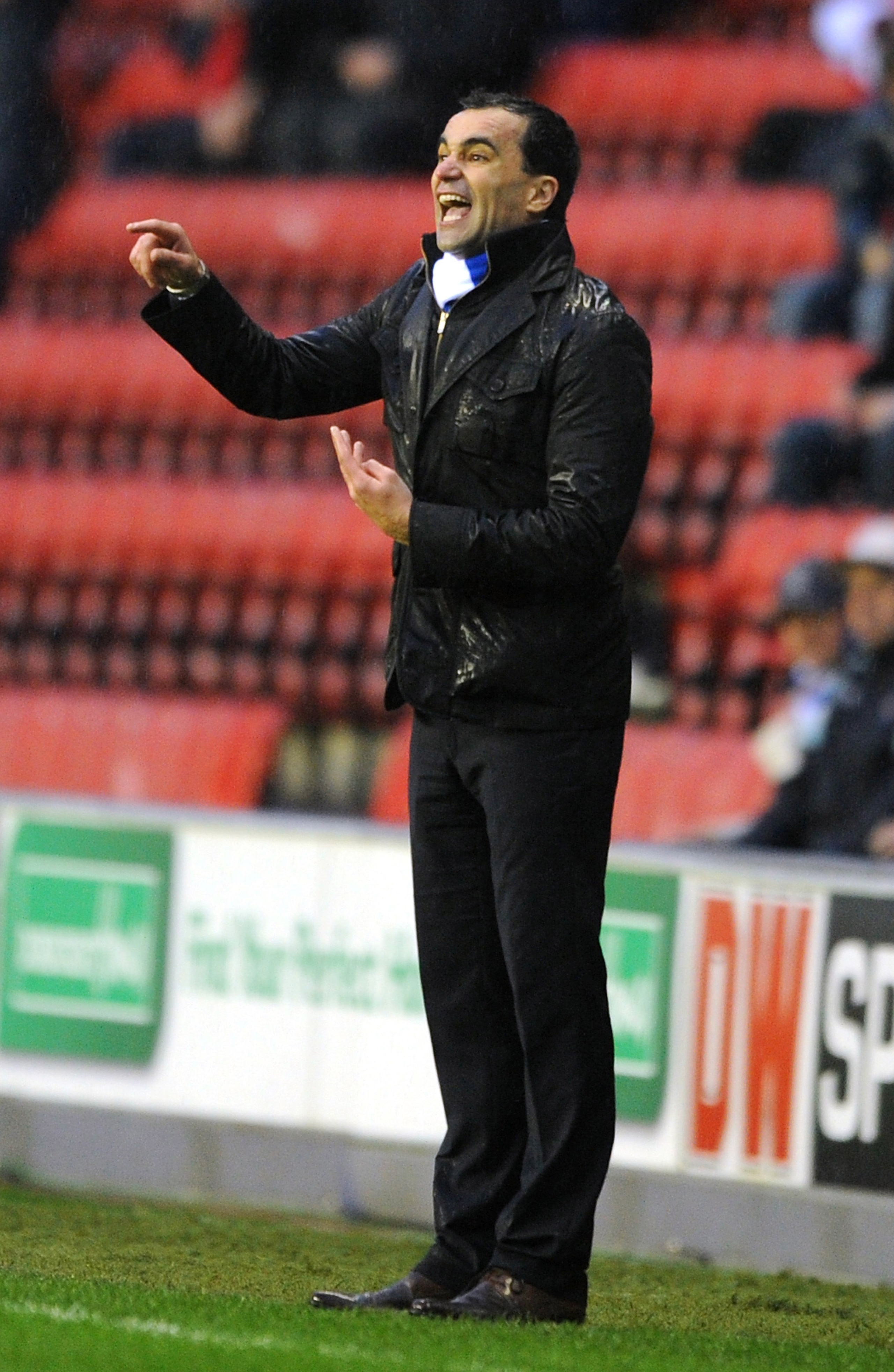 WIGAN, ENGLAND - FEBRUARY 05:  Roberto Martinez manager of Wigan Athletic gives instructions from the touchline during the Barclays Premier League match between Wigan Athletic and Blackburn Rovers at DW Stadium on February 5, 2011 in Wigan, England.  (Pho