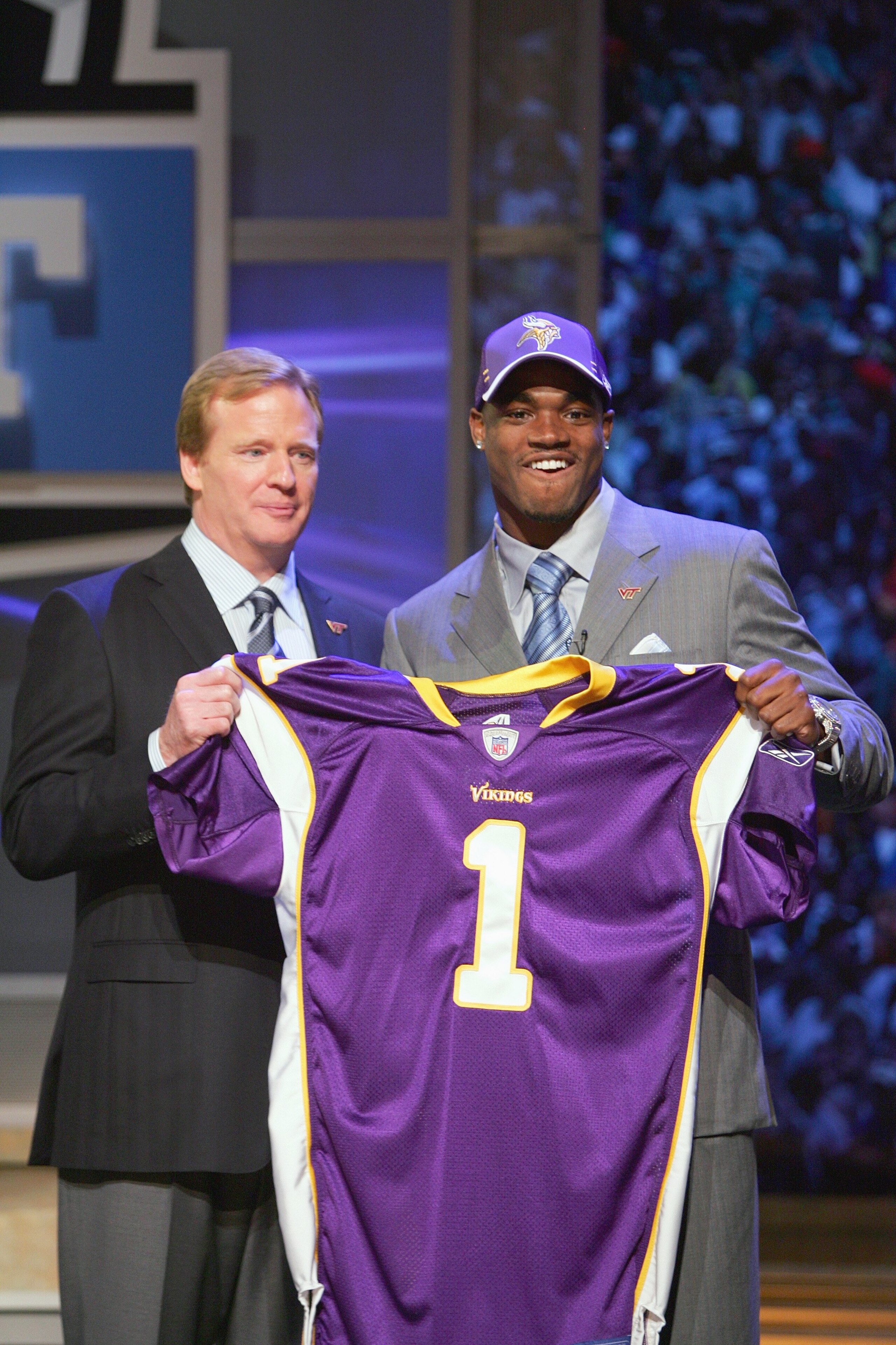 NEW YORK - APRIL 28:  Running back Adrian Peterson of Oklahoma poses for a photo with NFL Commissioner Roger Goodell after being drafted by the Minnesota Vikings during the 2007 NFL Draft on April 28, 2007 at Radio City Music Hall in New York, New York. (