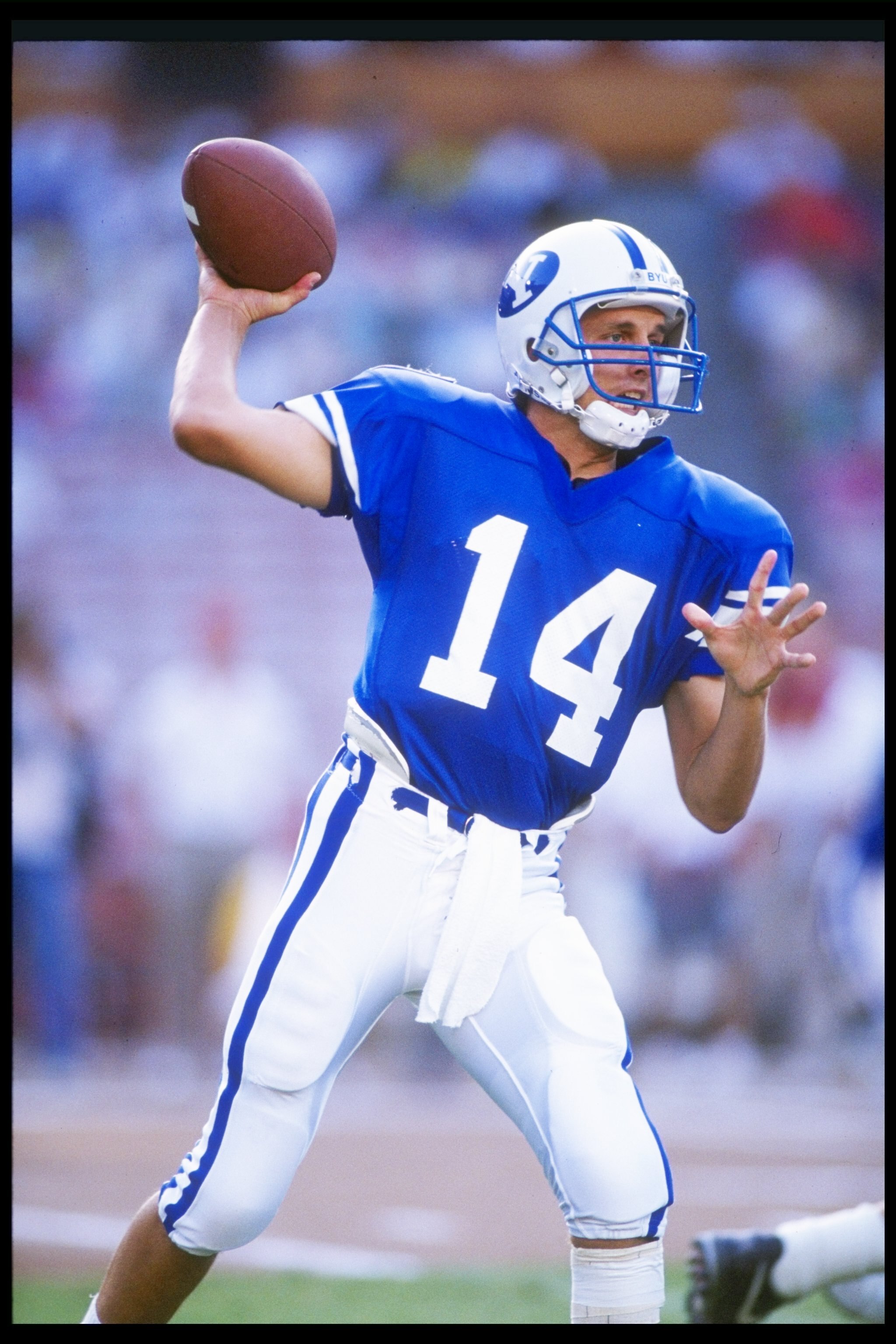 29 Aug 1991: Quarterback Ty Detmer of the Brigham Young Cougars throws a pass during a game against the Florida State Seminoles at the Pigskin Classic at Anaheim Stadium in Anaheim, California. Florida State won the game 44-28. Mandatory Credit: Stephen 29 Aug 1991: Quarterback Ty Detmer of the Brigham Young Cougars throws a pass during a game against the Florida State Seminoles at the Pigskin Classic at Anaheim Stadium in Anaheim, California. Florida State won the game 44-28. Mandatory Credit: Stephen