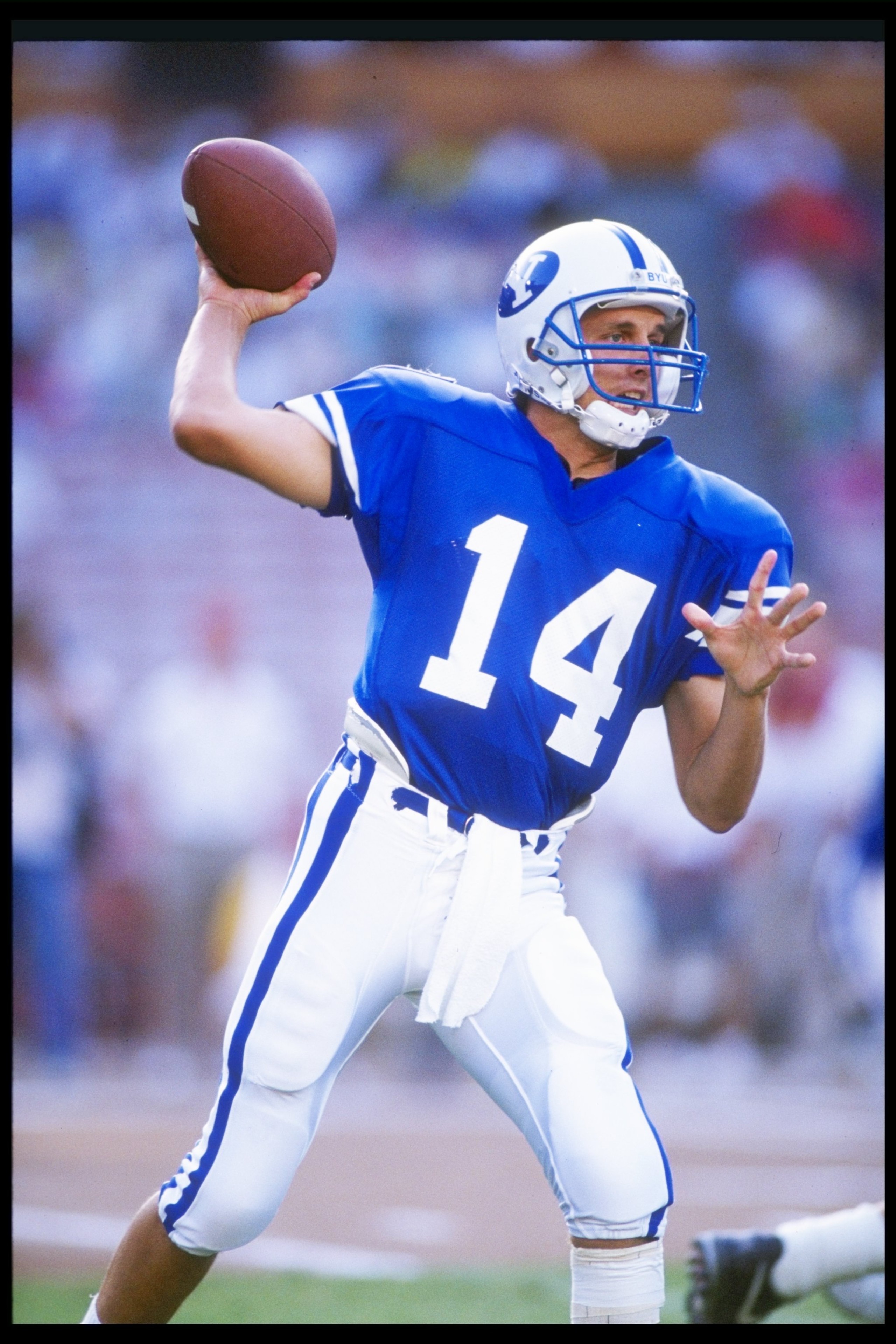 29 Aug 1991:  Quarterback Ty Detmer of the Brigham Young Cougars throws a pass during a game against the Florida State Seminoles at the Pigskin Classic at Anaheim Stadium in Anaheim, California.  Florida State won the game 44-28. Mandatory Credit: Stephen