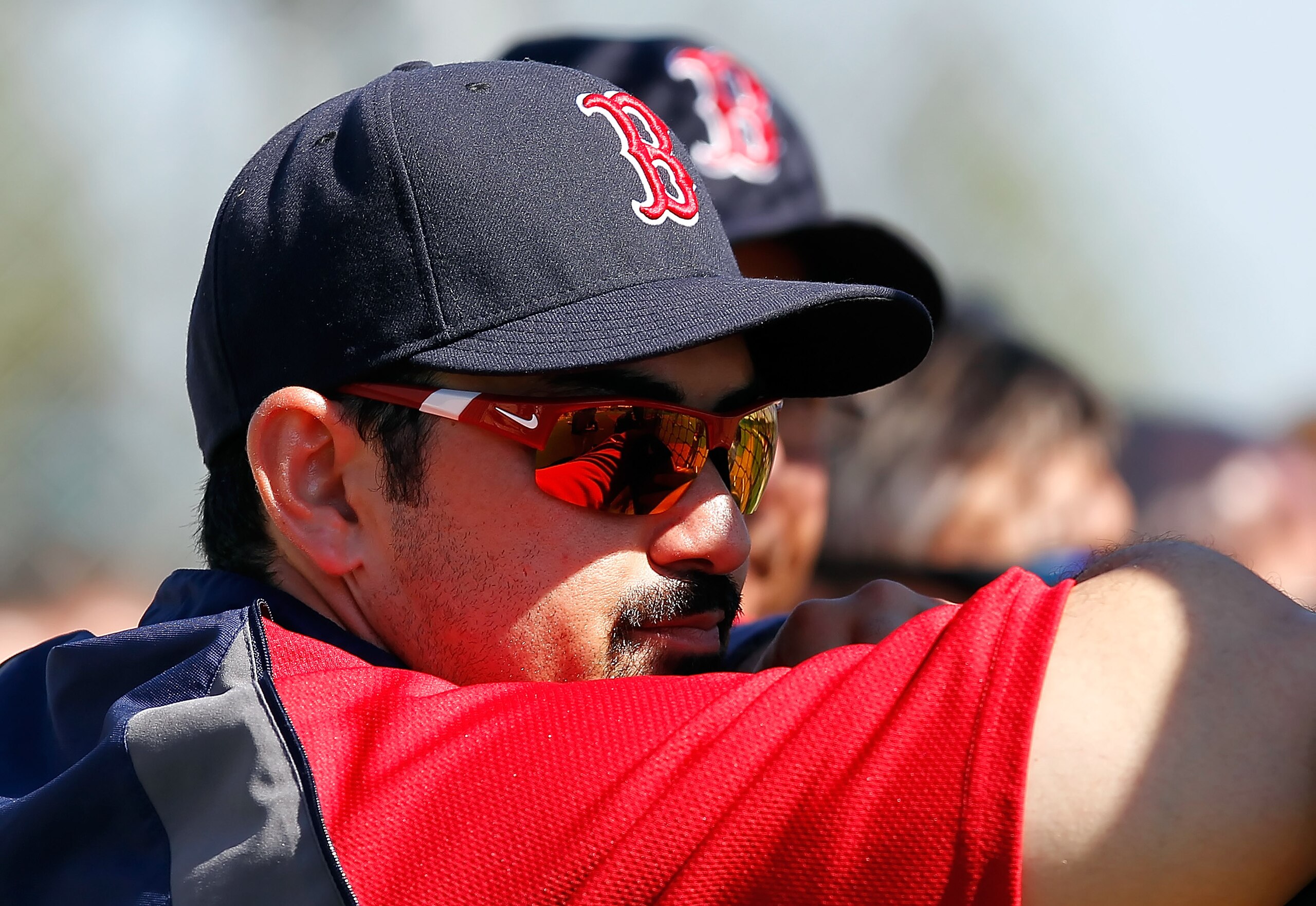 FORT MYERS, FL - FEBRUARY 19: First baseman Adrian Gonzalez #28 of the Boston Red Sox watches batting practice during a Spring Training Workout Session at the Red Sox Player Development Complex on February 19, 2011 in Fort Myers, Florida. (Photo by J. M FORT MYERS, FL - FEBRUARY 19: First baseman Adrian Gonzalez #28 of the Boston Red Sox watches batting practice during a Spring Training Workout Session at the Red Sox Player Development Complex on February 19, 2011 in Fort Myers, Florida. (Photo by J. M