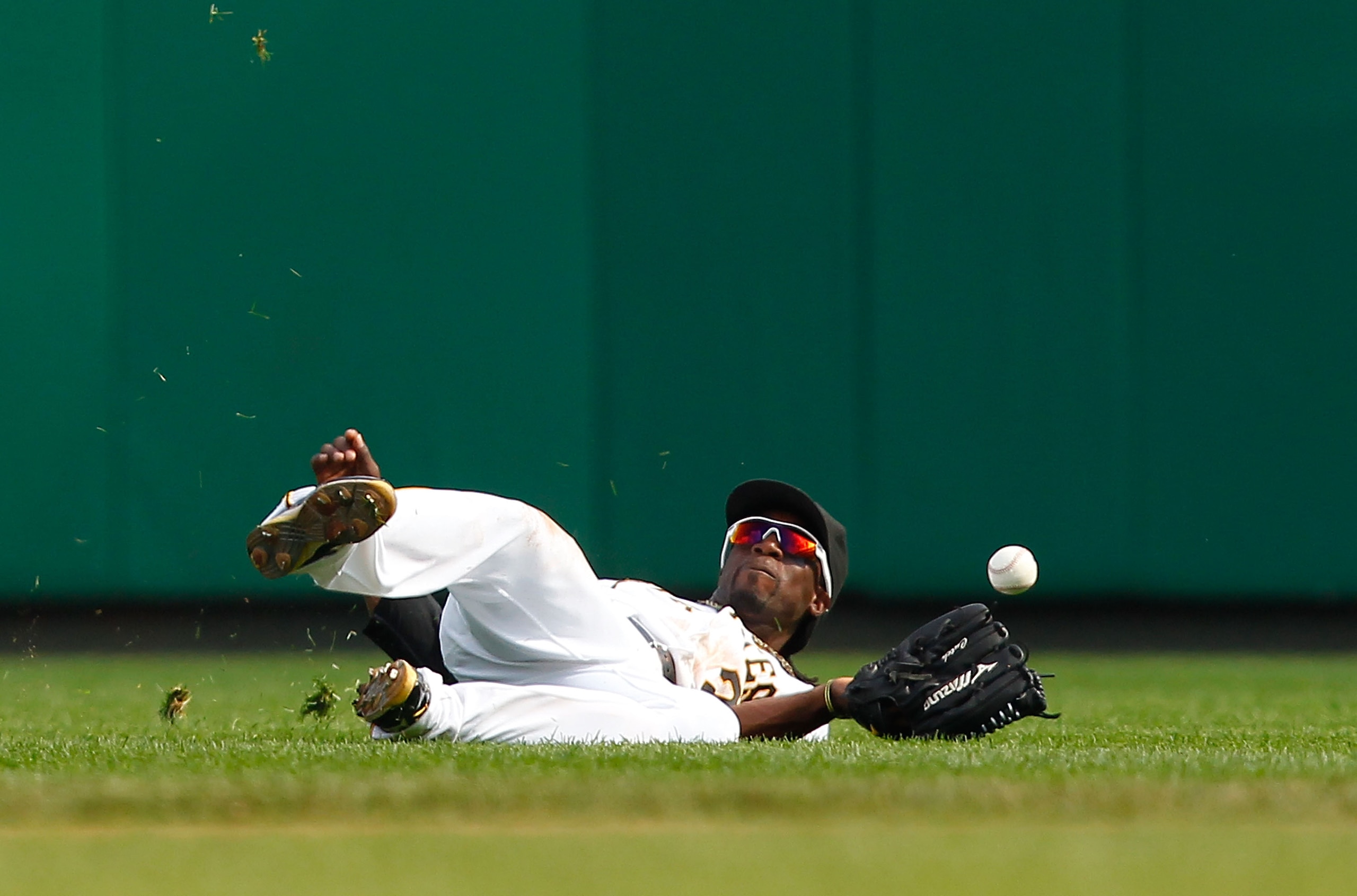 PITTSBURGH - SEPTEMBER 23: Andrew McCutchen #22 of the Pittsburgh Pirates misses a fly ball in the outfield during the game against the St Louis Cardinals on September 23, 2010 at PNC Park in Pittsburgh, Pennsylvania. (Photo by Jared Wickerham/Getty Ima PITTSBURGH - SEPTEMBER 23: Andrew McCutchen #22 of the Pittsburgh Pirates misses a fly ball in the outfield during the game against the St Louis Cardinals on September 23, 2010 at PNC Park in Pittsburgh, Pennsylvania. (Photo by Jared Wickerham/Getty Ima