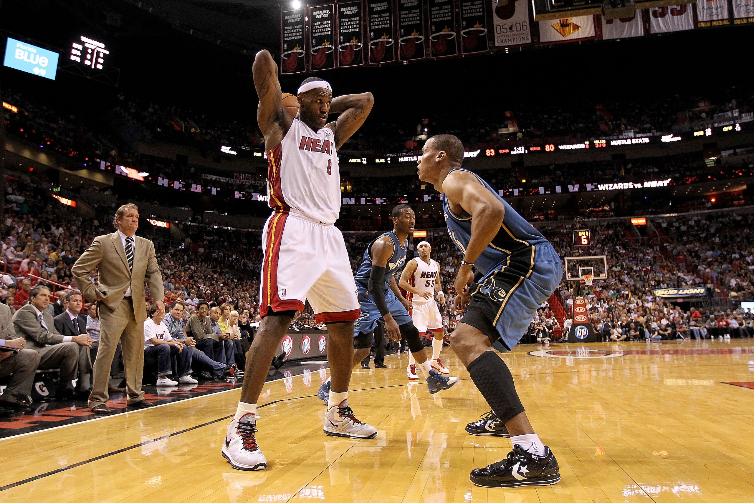 MIAMI, FL - FEBRUARY 25:  LeBron James #6 of the Miami Heat posts up against Maurice Evans #6 of the Washington Wizards during a game at American Airlines Arena on February 25, 2011 in Miami, Florida. NOTE TO USER: User expressly acknowledges and agrees t