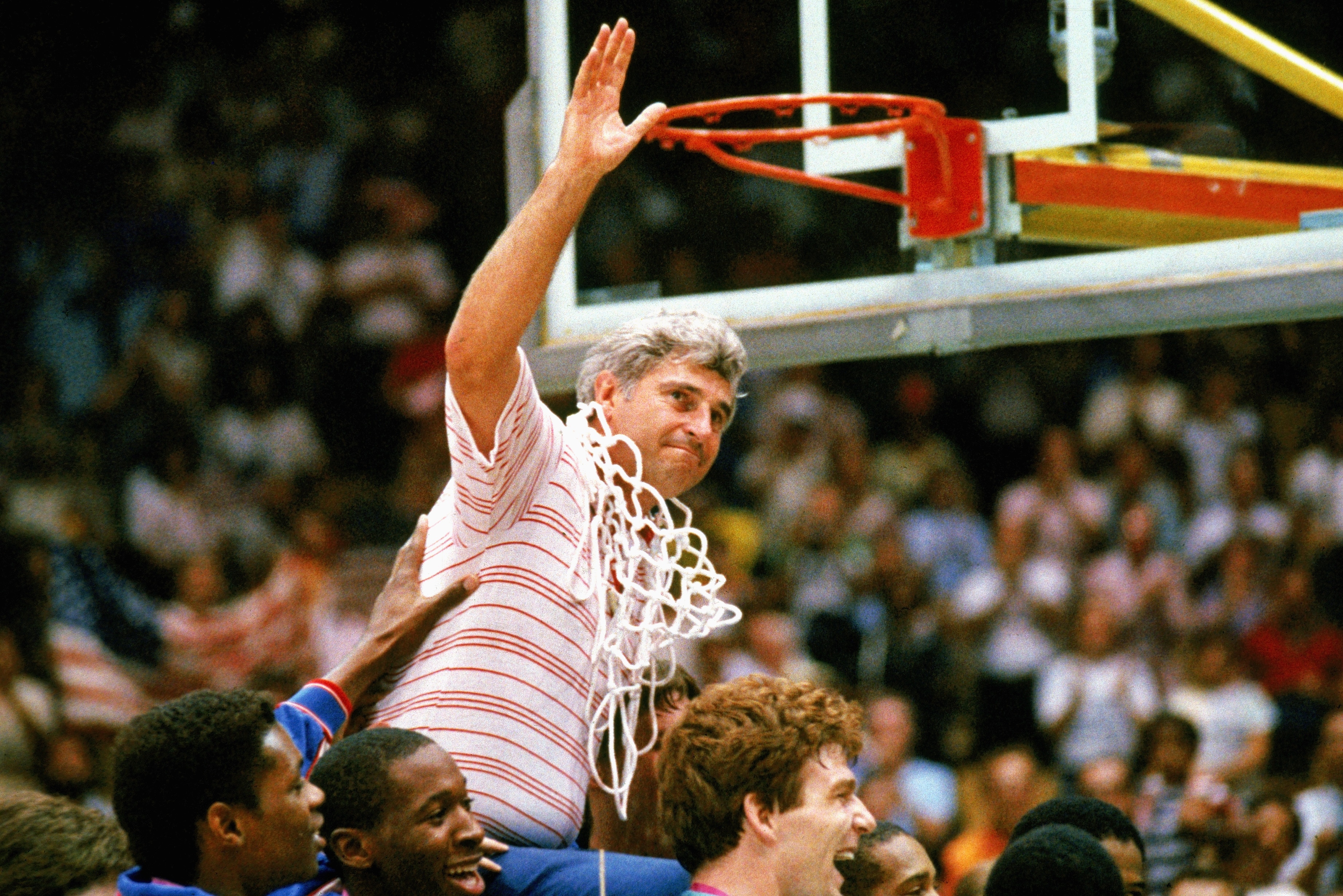 UNDATED: Bobby Knight coach for Indiana University mens basketball cuts down the nets to celebrate a big victory. (Photo by Getty Images)