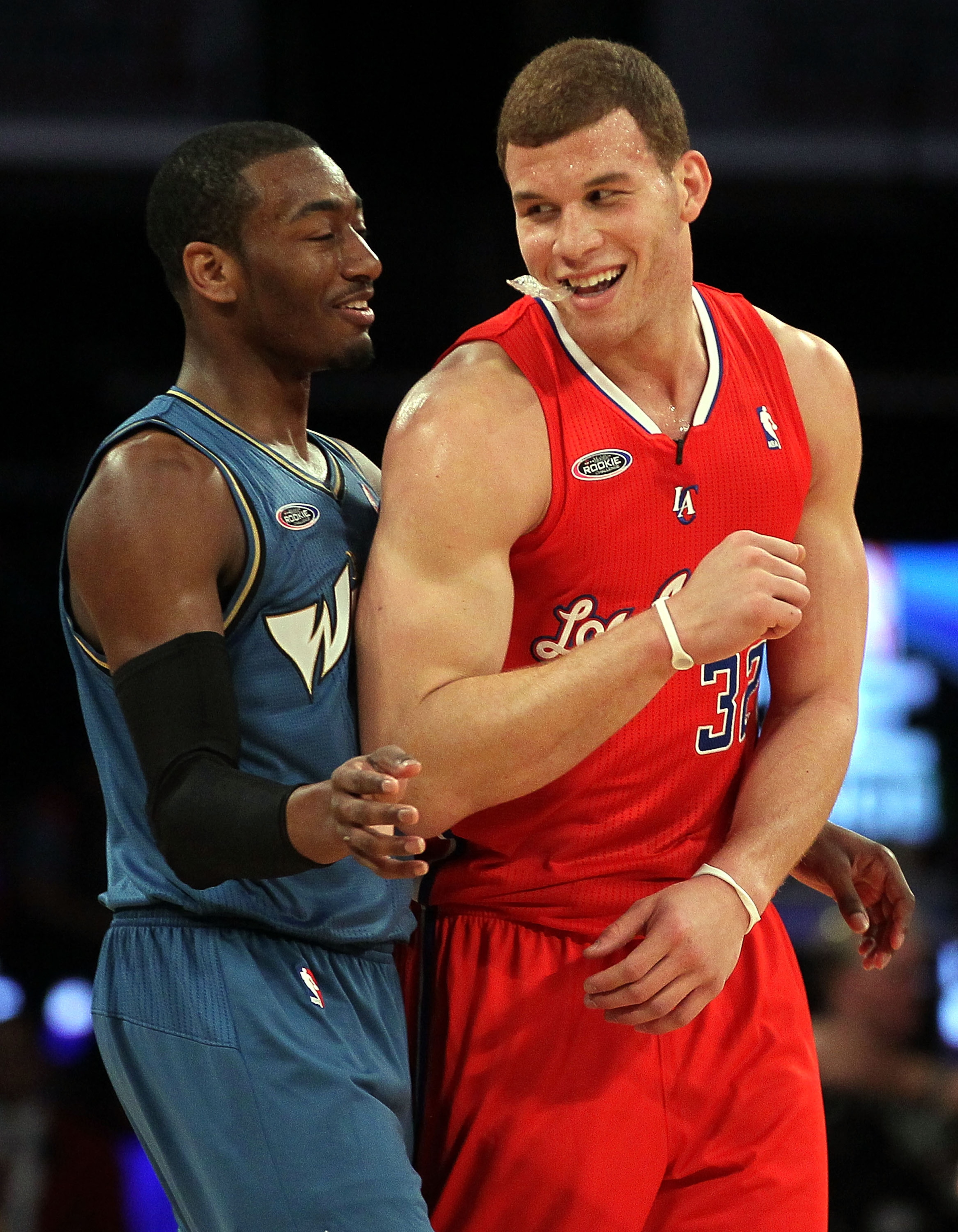 LOS ANGELES, CA - FEBRUARY 18:  John Wall #2 of the Washington Wizards and the Rookie Team and Blake Griffin #32 of the Los Angeles Clippers and the Rookie Team laugh on the court in the second half during the T-Mobile Rookie Challenge and Youth Jam at St