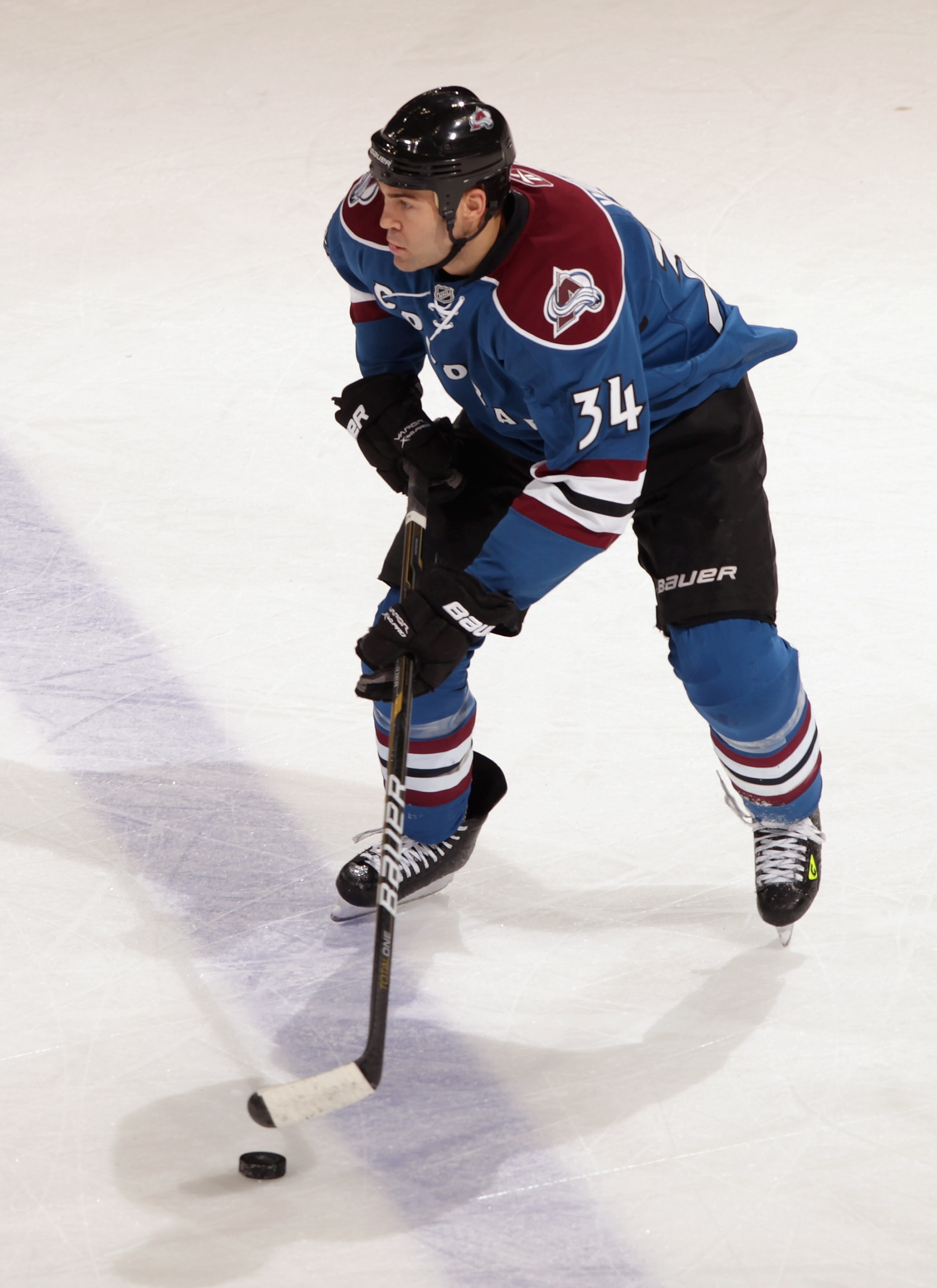 DENVER, CO - FEBRUARY 16: Daniel Winnik #34 of the Colorado Avalanche controls the puck against the Pittsburgh Penguins at the Pepsi Center on February 16, 2011 in Denver, Colorado. The Penguins defeated the Avalanche 3-2 in overtime. (Photo by Doug Pen DENVER, CO - FEBRUARY 16: Daniel Winnik #34 of the Colorado Avalanche controls the puck against the Pittsburgh Penguins at the Pepsi Center on February 16, 2011 in Denver, Colorado. The Penguins defeated the Avalanche 3-2 in overtime. (Photo by Doug Pen