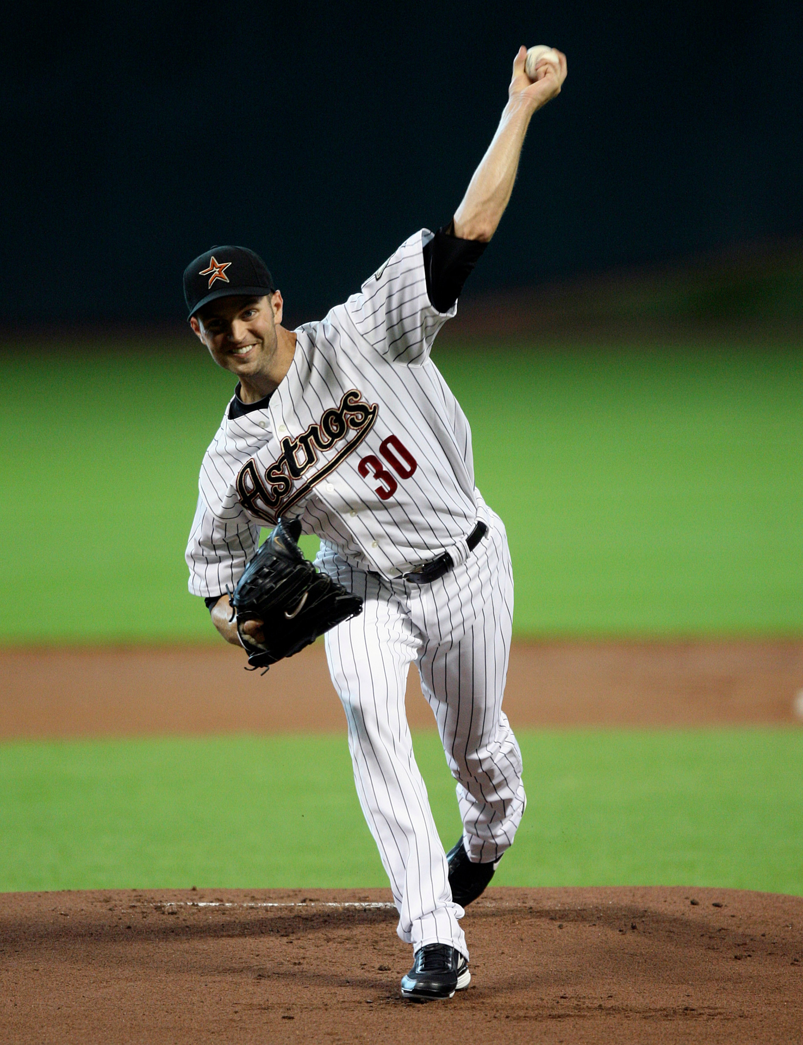 HOUSTON - JULY 30: Pitcher J.A. Happ #30 of the Houston Astros throws against the Milwaukee Brewers at Minute Maid Park on July 30, 2010 in Houston, Texas. (Photo by Bob Levey/Getty Images) HOUSTON - JULY 30: Pitcher J.A. Happ #30 of the Houston Astros throws against the Milwaukee Brewers at Minute Maid Park on July 30, 2010 in Houston, Texas. (Photo by Bob Levey/Getty Images)