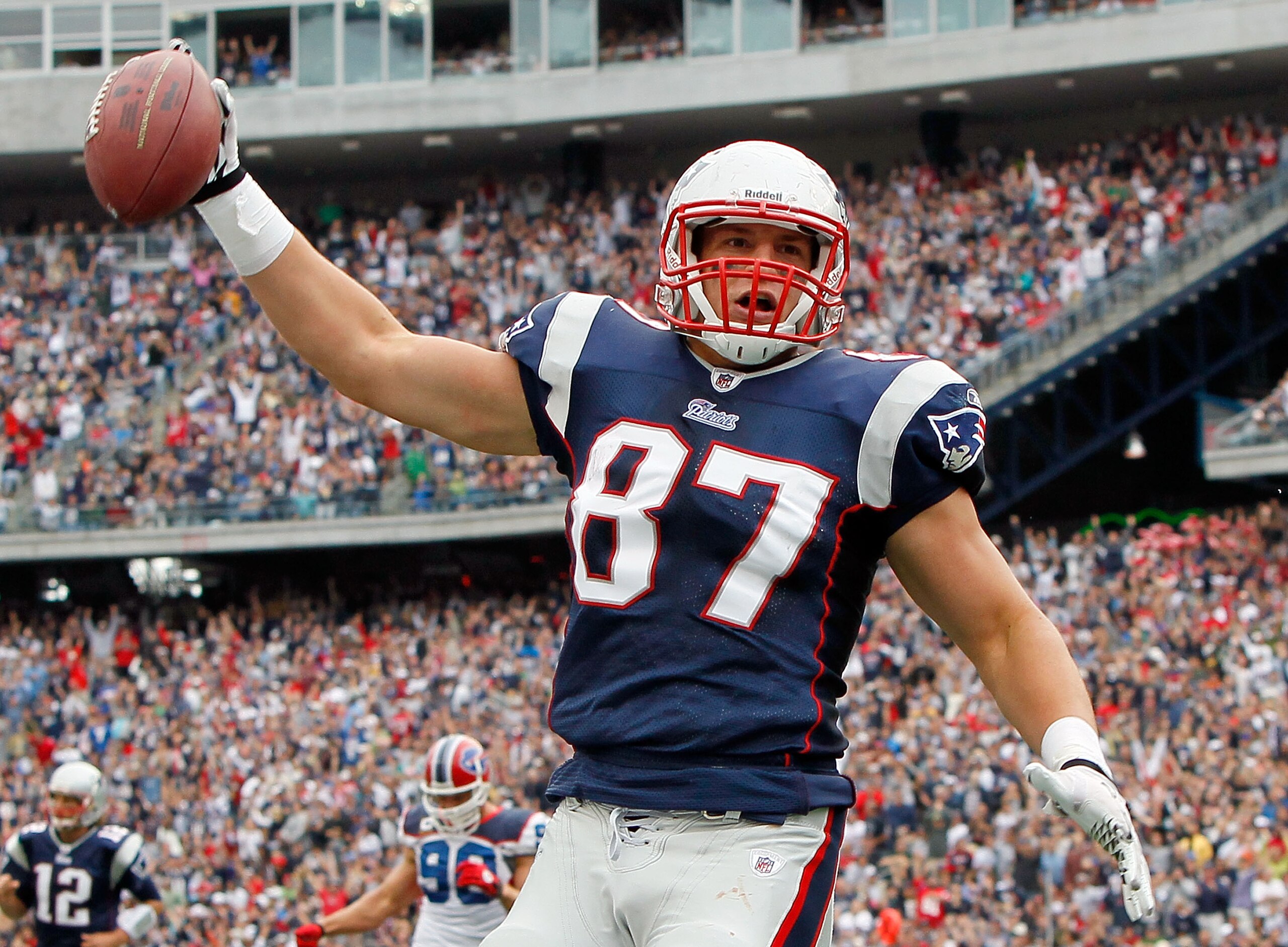 FOXBORO, MA - SEPTEMBER 26: Rob Gronkowski #87 of the New England Patriots reacts after scoring a touchdown against the Buffalo Bills at Gillette Stadium in the second half on September 26, 2010 in Foxboro, Massachusetts. (Photo by Jim Rogash/Getty Image FOXBORO, MA - SEPTEMBER 26: Rob Gronkowski #87 of the New England Patriots reacts after scoring a touchdown against the Buffalo Bills at Gillette Stadium in the second half on September 26, 2010 in Foxboro, Massachusetts. (Photo by Jim Rogash/Getty Image