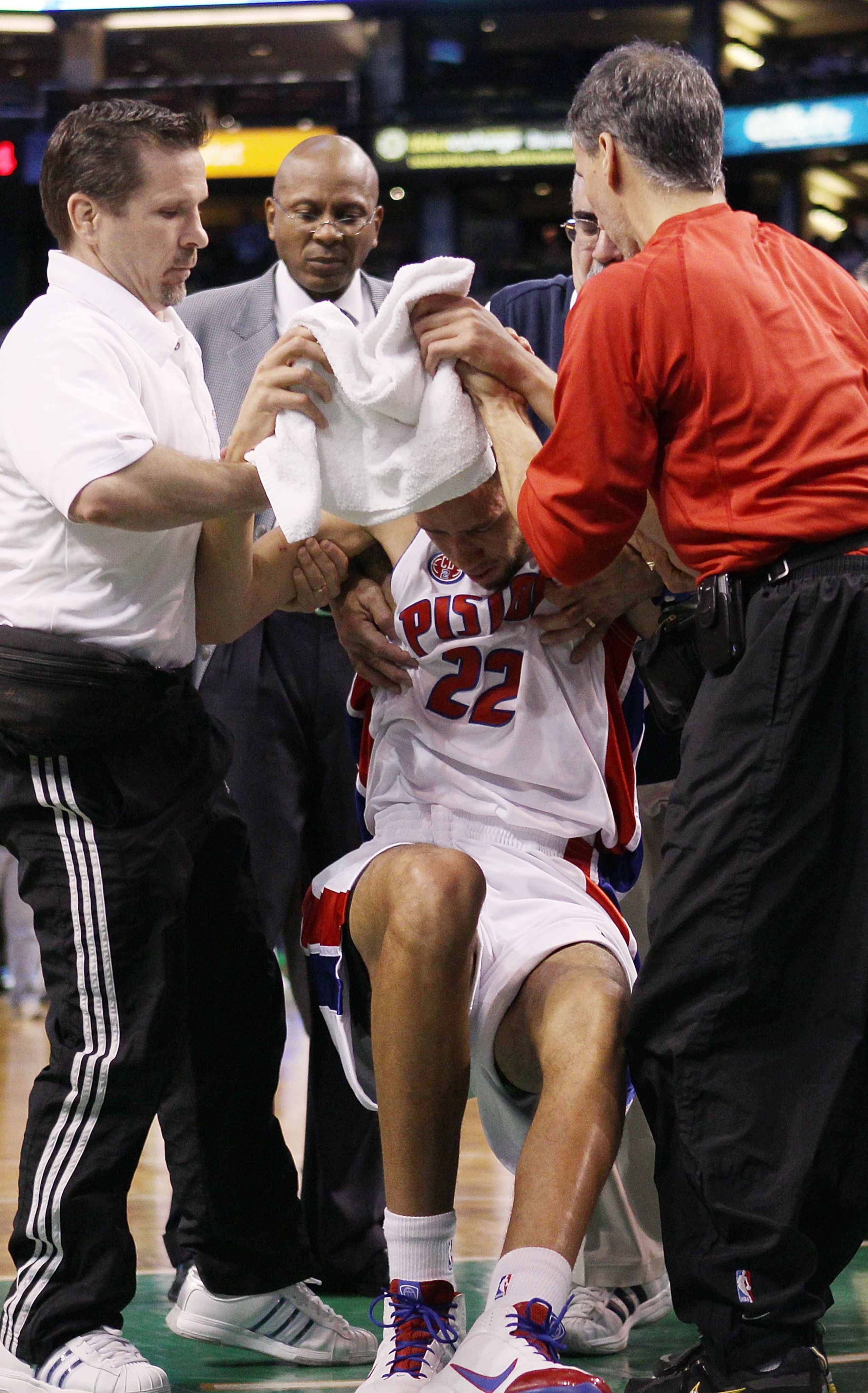 BOSTON - MARCH 15: Tayshaun Prince #22 of the Detroit Pistons is helped off the court in the first quarter against the Boston Celtics on March 15, 2010 at the TD Garden in Boston, Massachusetts. NOTE TO USER: User expressly acknowledges and agrees that BOSTON - MARCH 15: Tayshaun Prince #22 of the Detroit Pistons is helped off the court in the first quarter against the Boston Celtics on March 15, 2010 at the TD Garden in Boston, Massachusetts. NOTE TO USER: User expressly acknowledges and agrees that