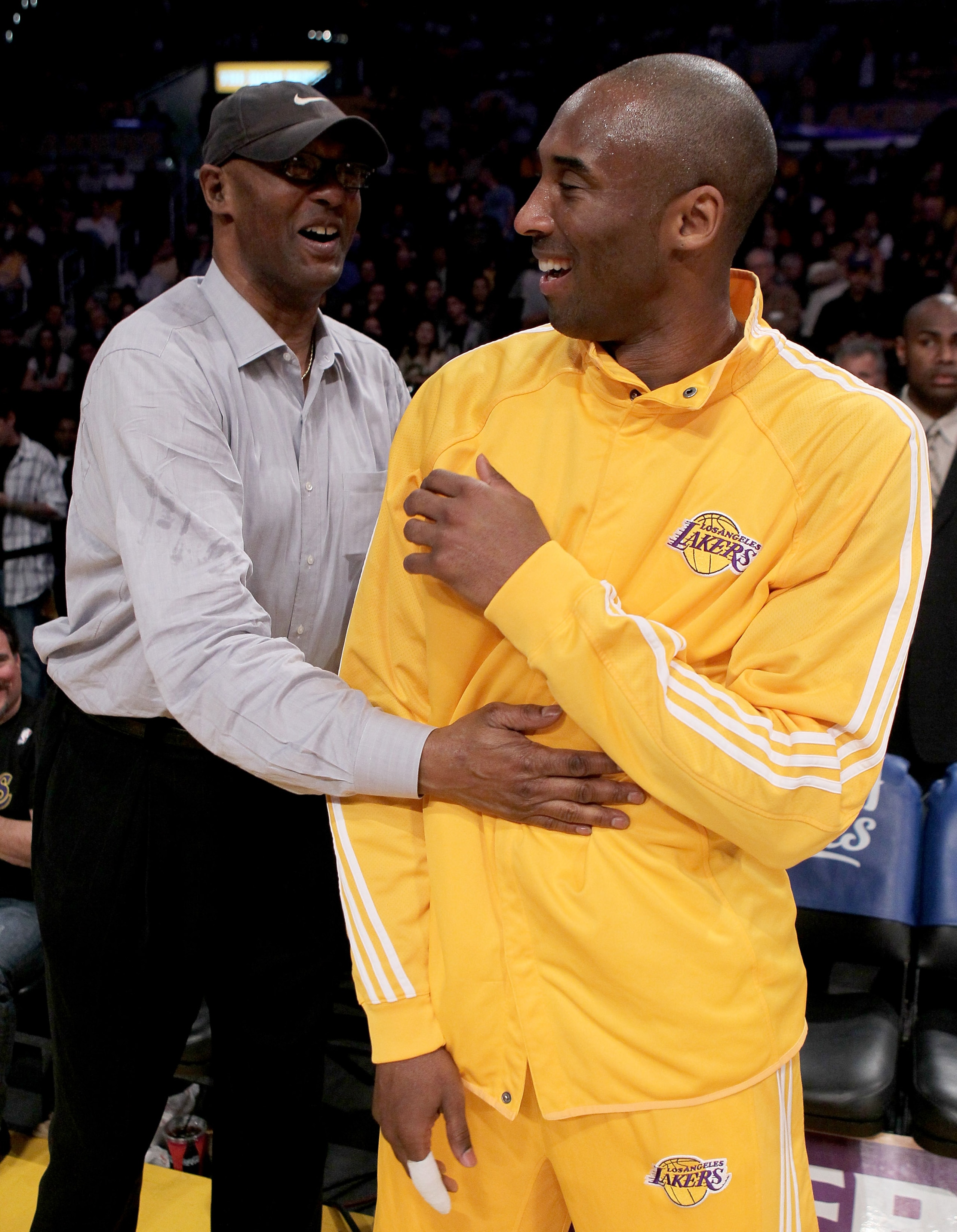 LOS ANGELES - APRIL 20:  Kobe Bryant #24 of the Los Angeles Lakers laughs with father Joe Jelly Bean Bryant before playing the Oklahoma City Thunder during  Game Two of the Western Conference Quarterfinals of the 2010 NBA Playoffs on April 20, 2010 at Sta