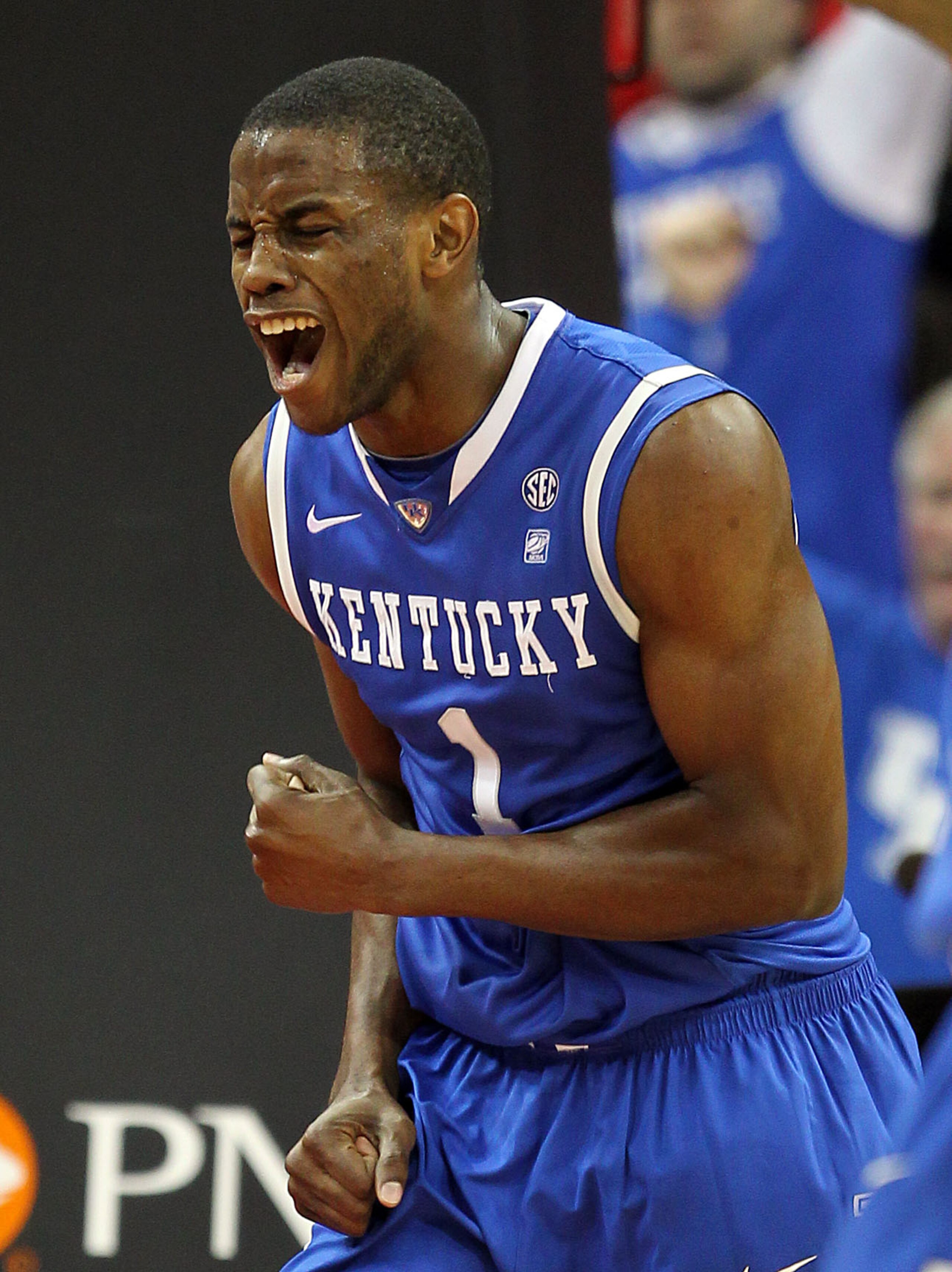 LOUISVILLE, KY - DECEMBER 31:  Darius Miller#1 of the Kentucky Wildcats celebrates during the game against the Louisville Cardinals at the KFC Yum! Center on December 31, 2010 in Louisville, Kentucky. Kentucky won 78-63.  (Photo by Andy Lyons/Getty Images