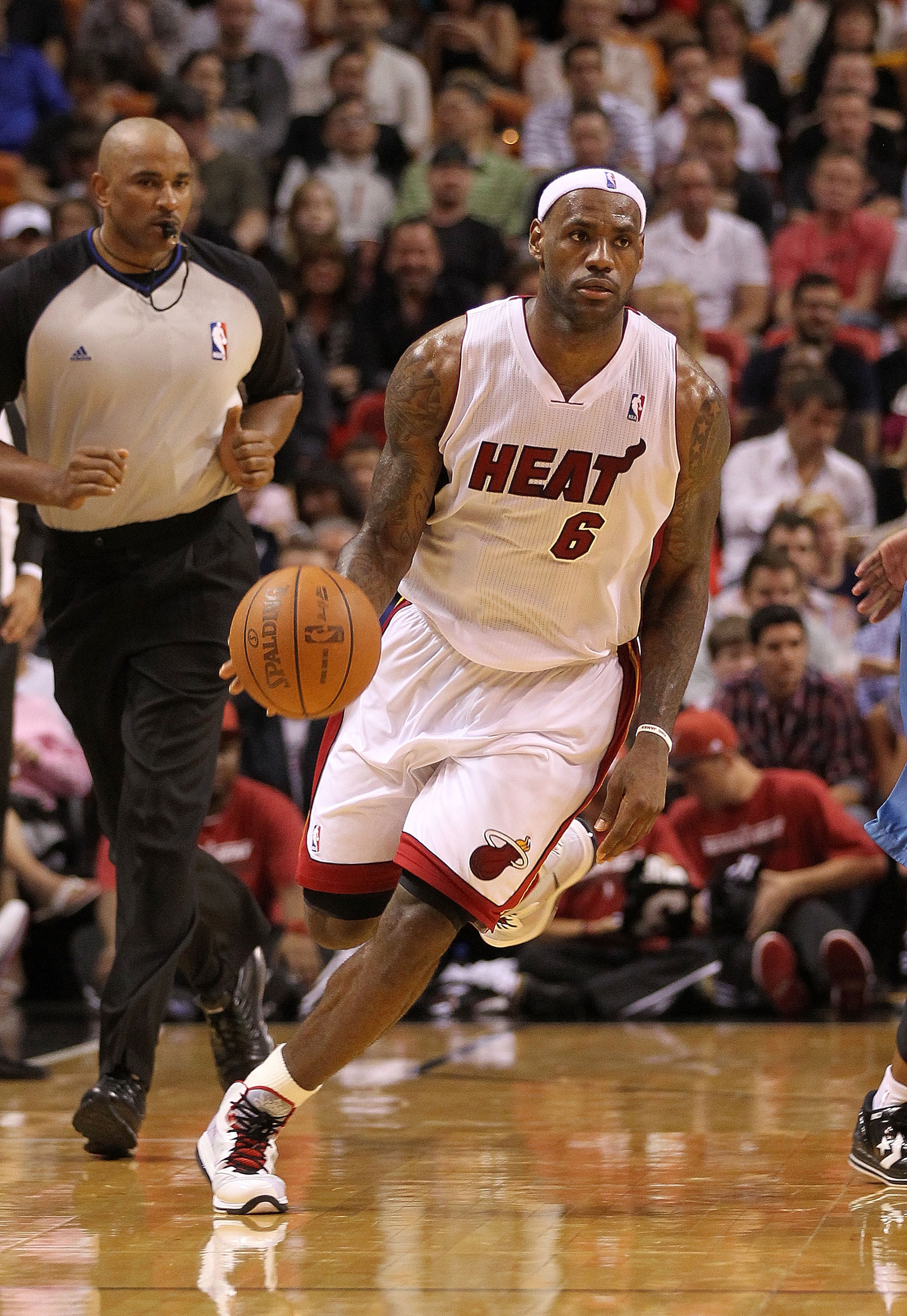 MIAMI, FL - FEBRUARY 25: LeBron James #6 of the Miami Heat brings the ball up the floor during a game against the Washington Wizards at American Airlines Arena on February 25, 2011 in Miami, Florida. NOTE TO USER: User expressly acknowledges and agrees th